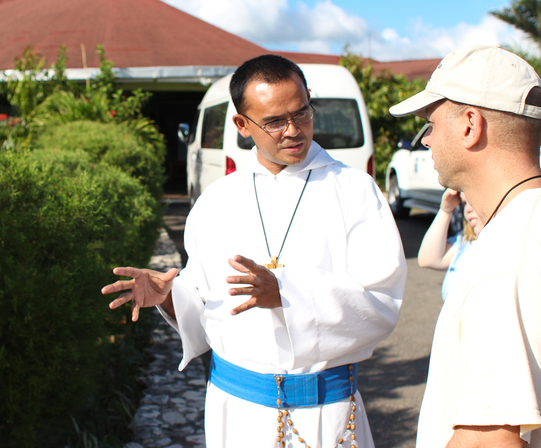 Fr. Dionisio, giving a tour of Mt. Tabor monastery to a group of volunteers.