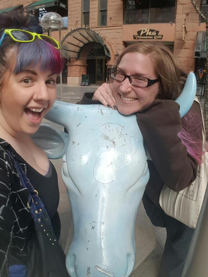 Me and my sister, Maddi (and a Denver Cow?).