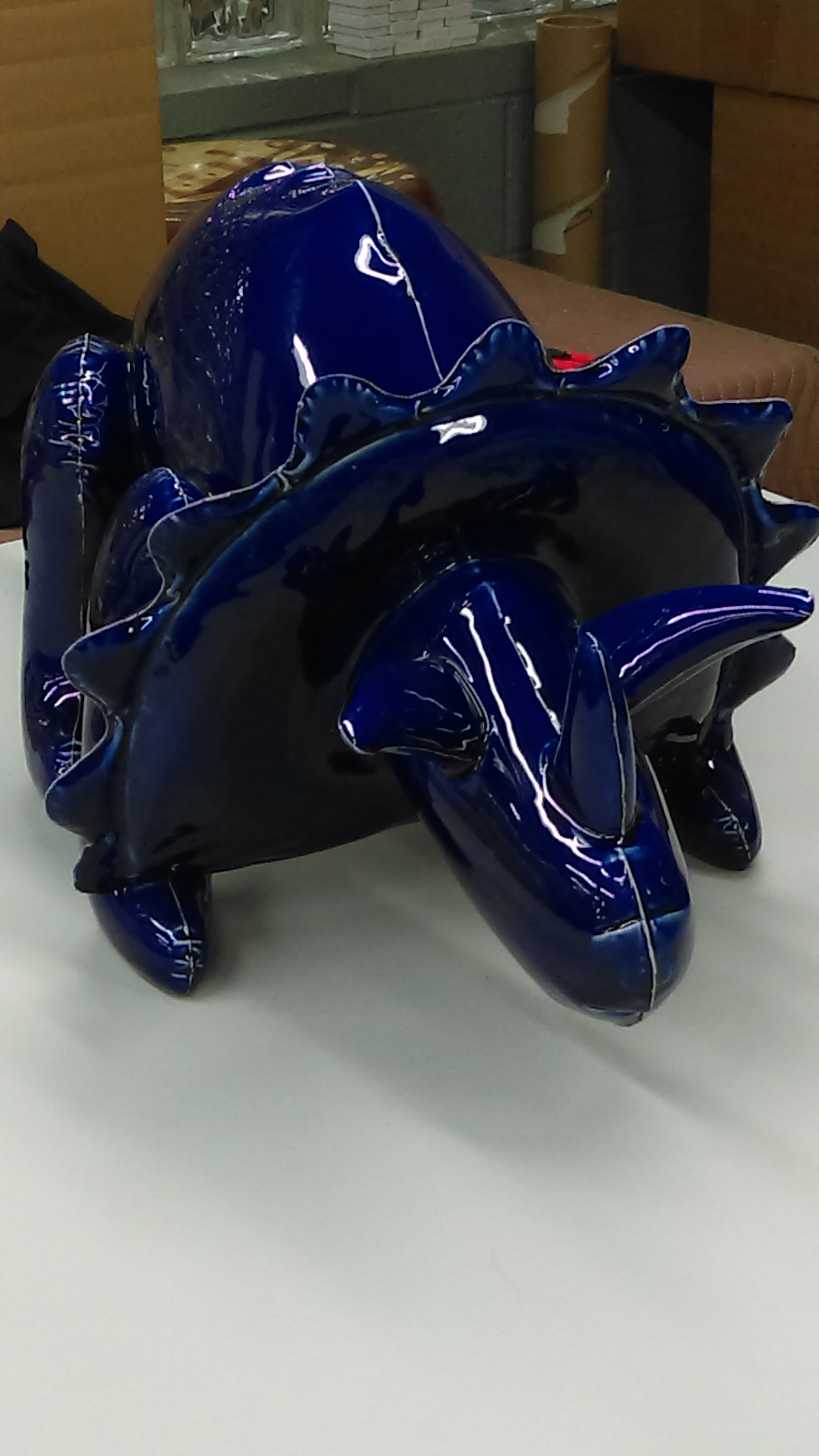 Inflatable Triceratops by Brett Kern (slip cast ceramic, gold luster, commercial glazes). All of Brett’s inflatable dinosaurs are amazing and I want one.