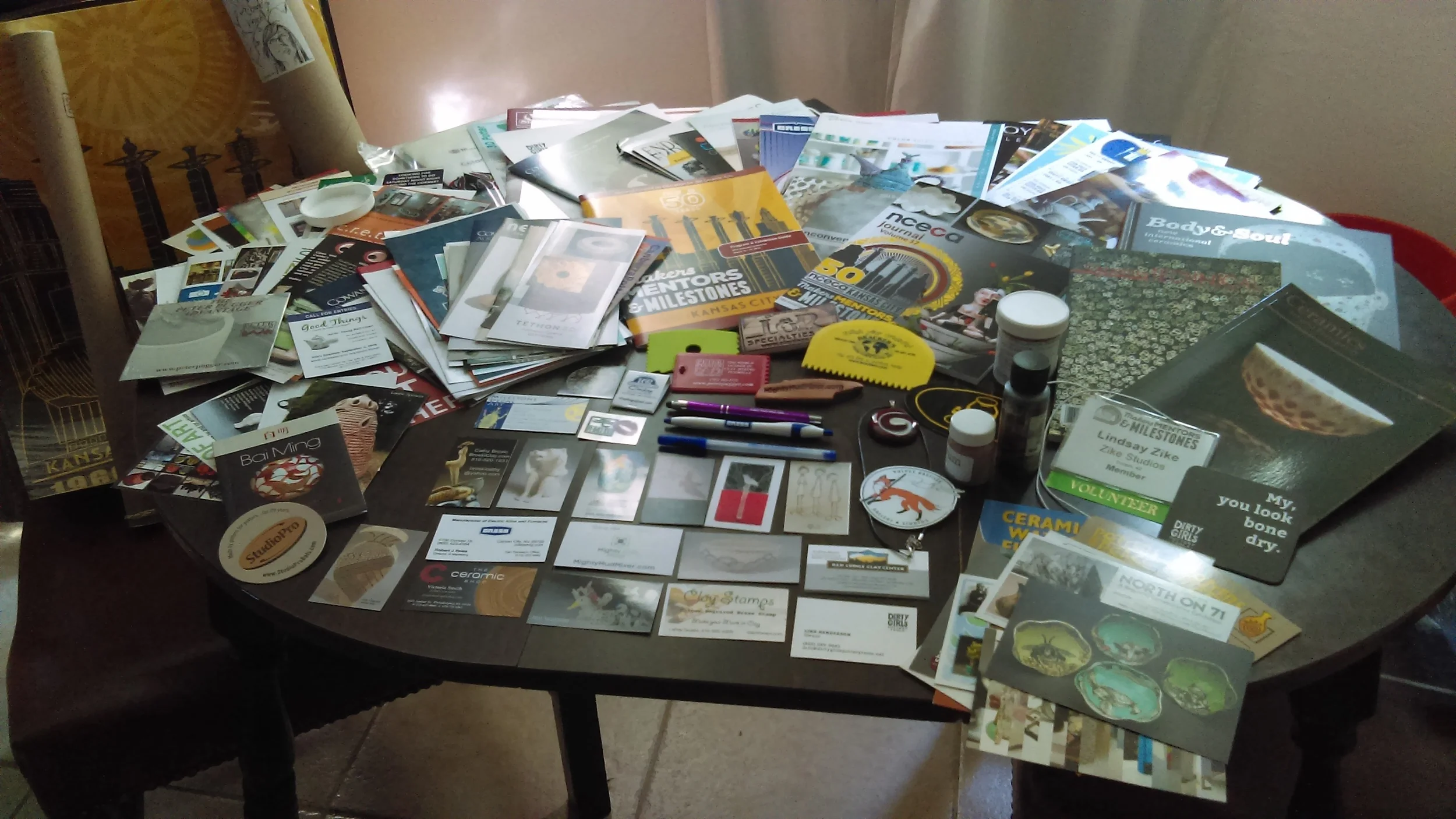 Swag from the Resources Floor. Mostly fliers and brochures, but also some samples, posters, pens and ribs.
