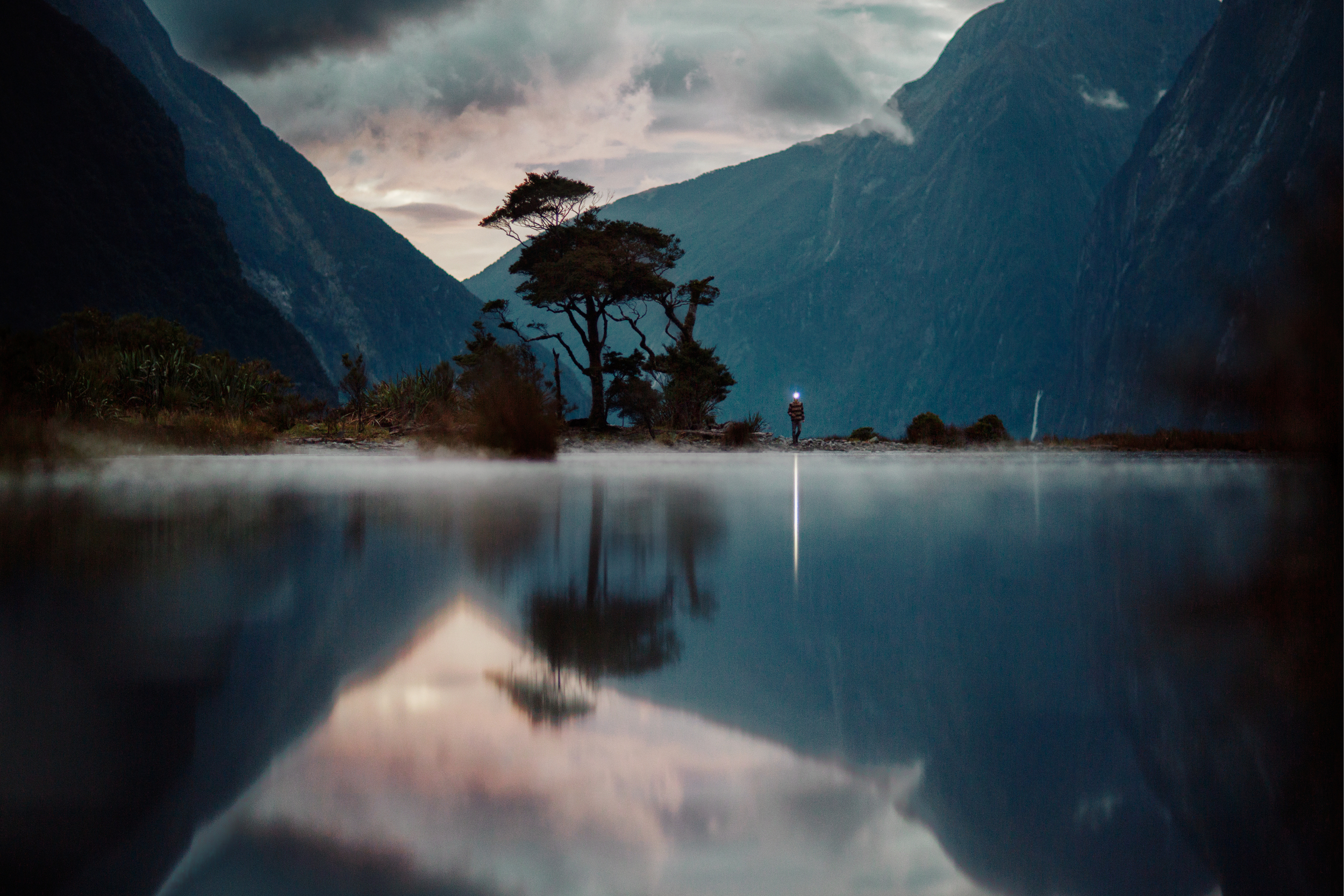  Steep fjords casting luminous shadows below telling us the day was fading.&nbsp; 