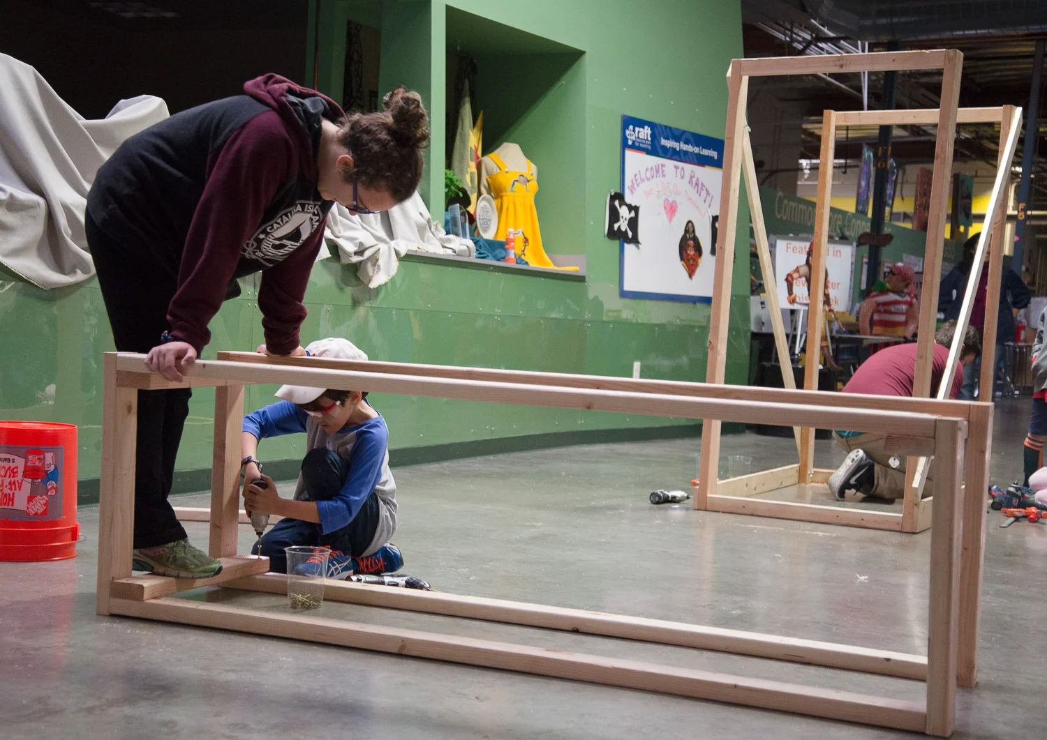 Sophia and Robert make progress on the brush.