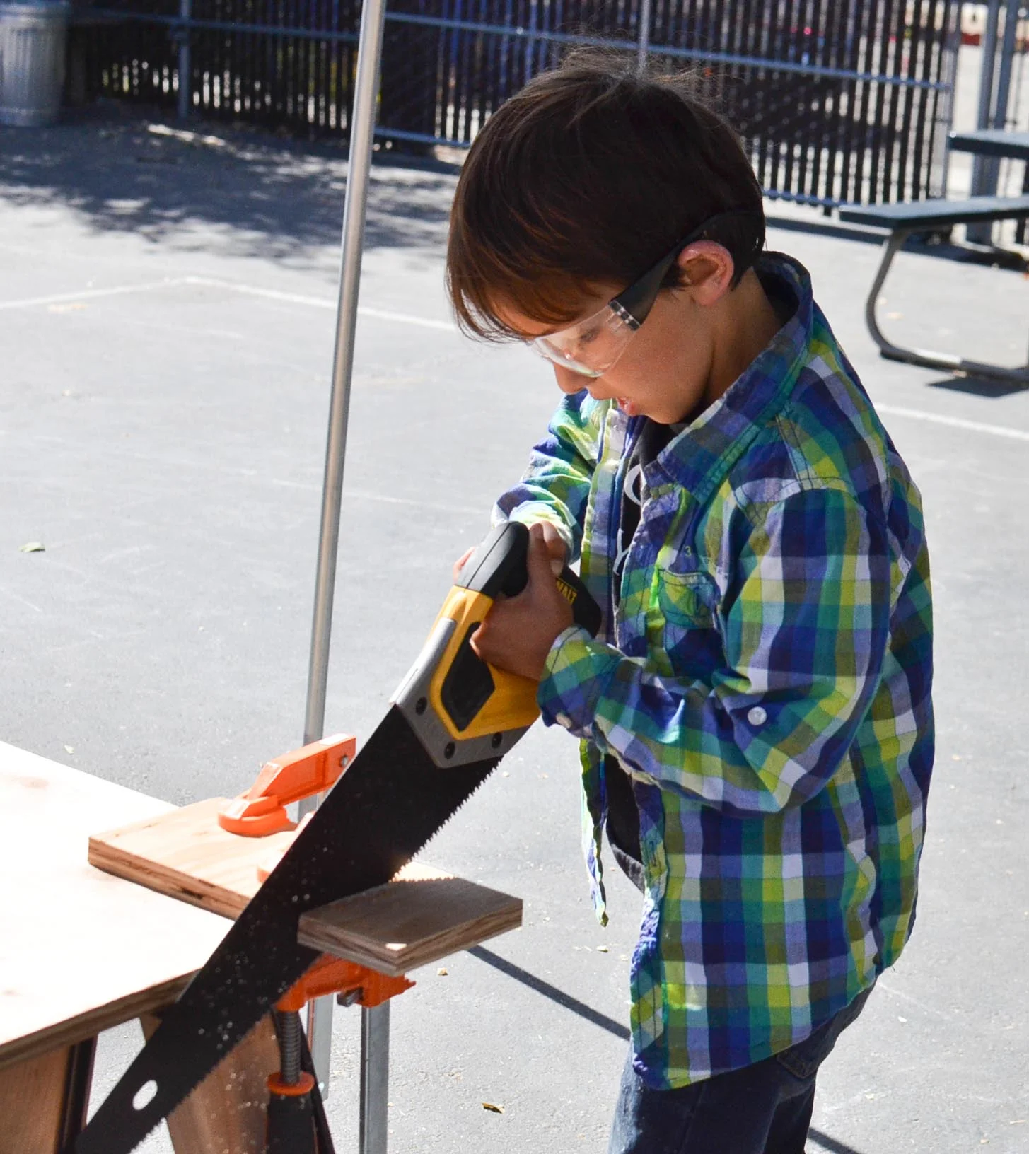 Griffin demonstrates great technique with the hand saw. 