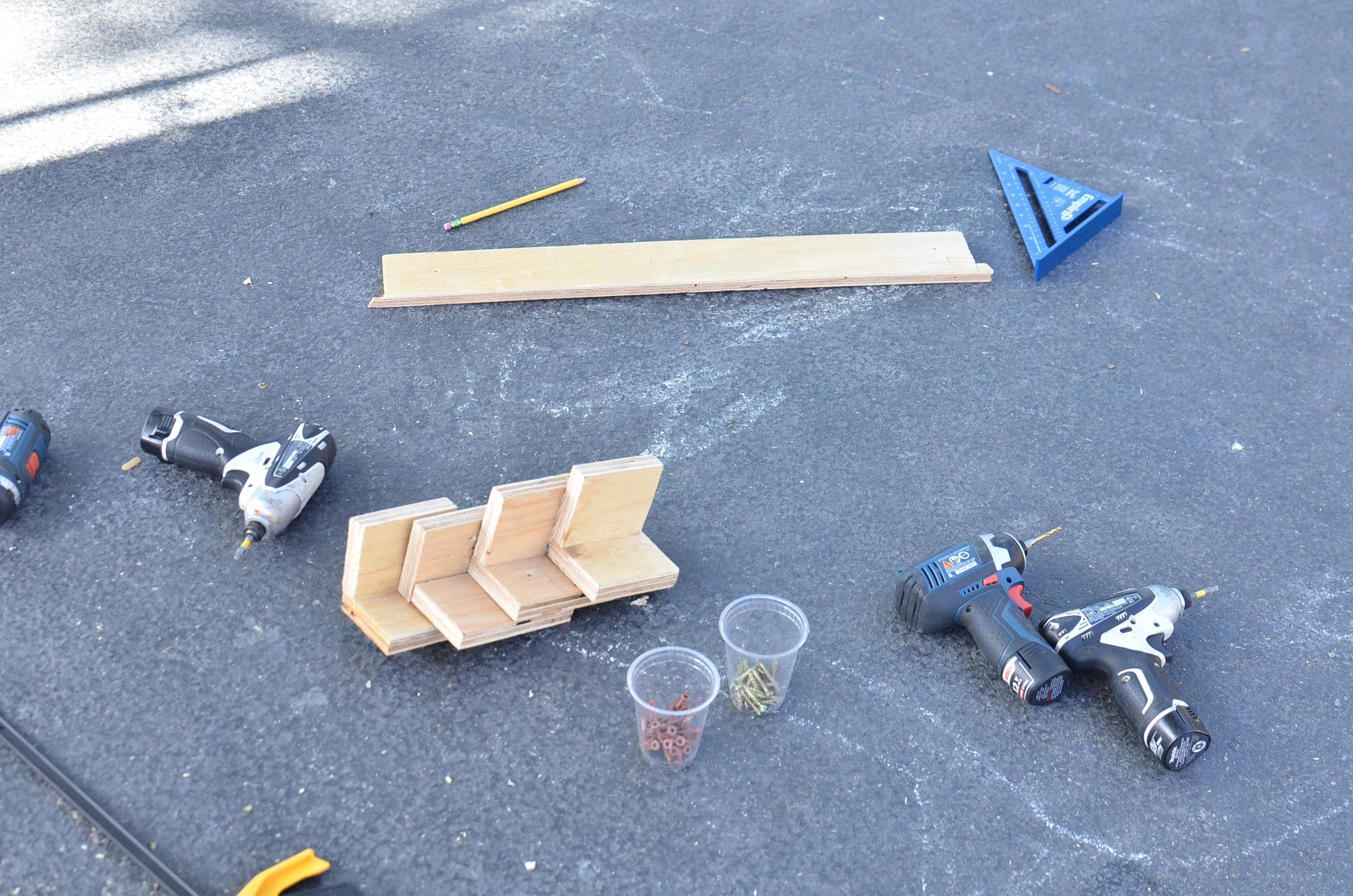 The wood waterfall comes to life. (Note the clean work space with all the screws neatly in a storage cup!)