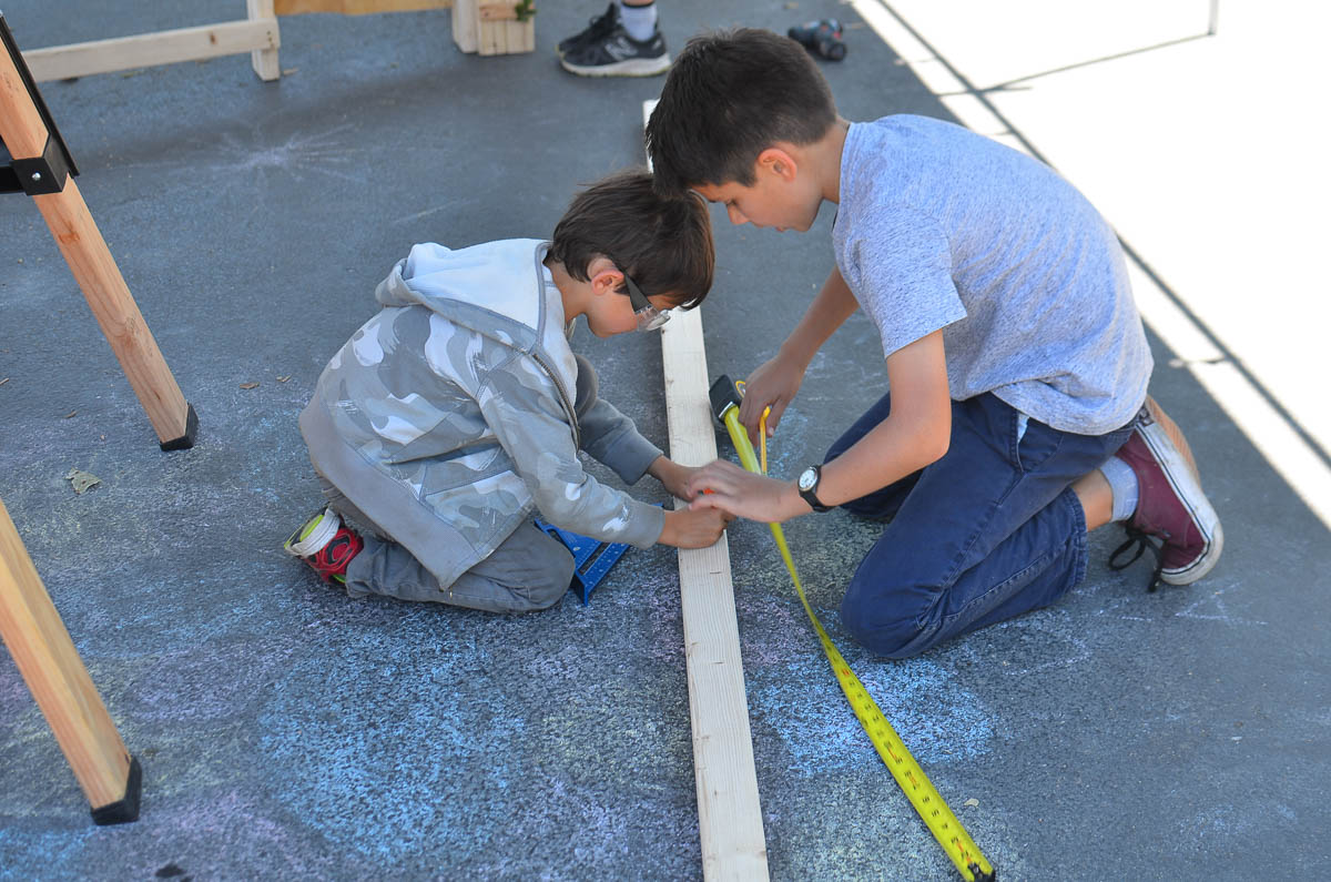  Ben and Griffin measuring and marking. 