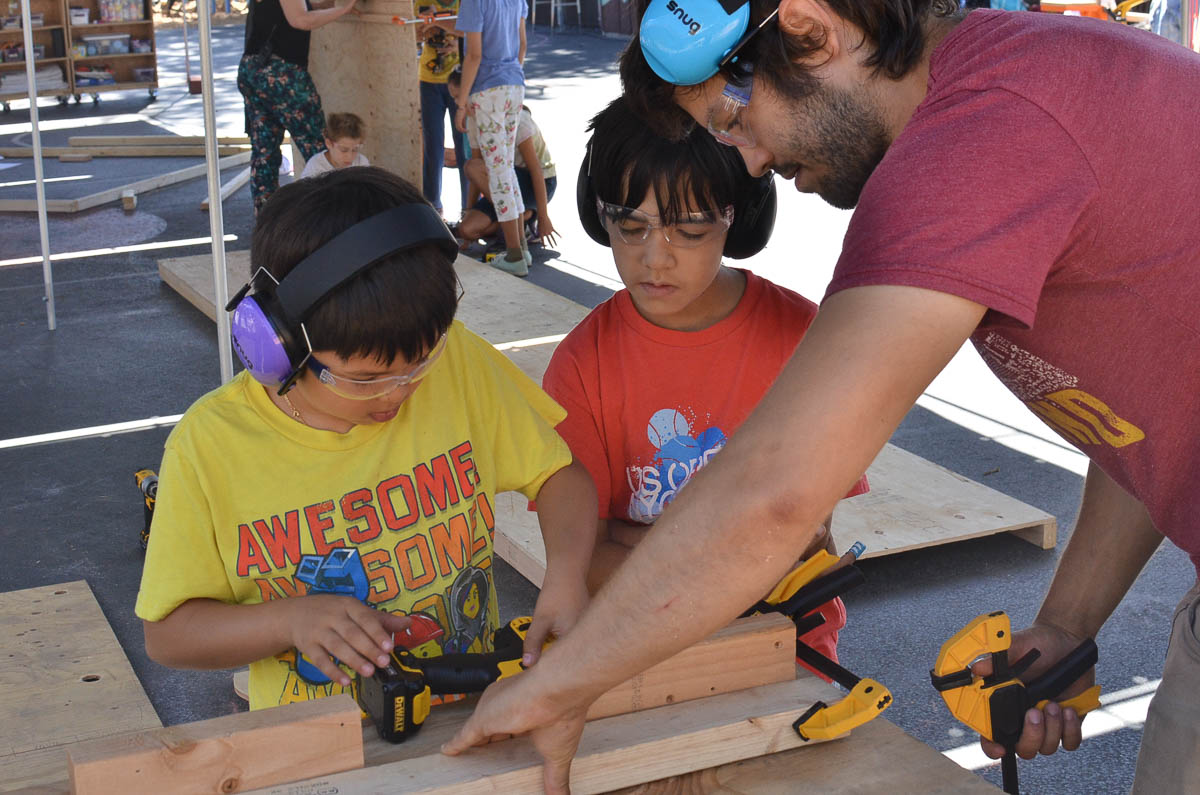  Eugene, Robert and Josh working on props for the past. 