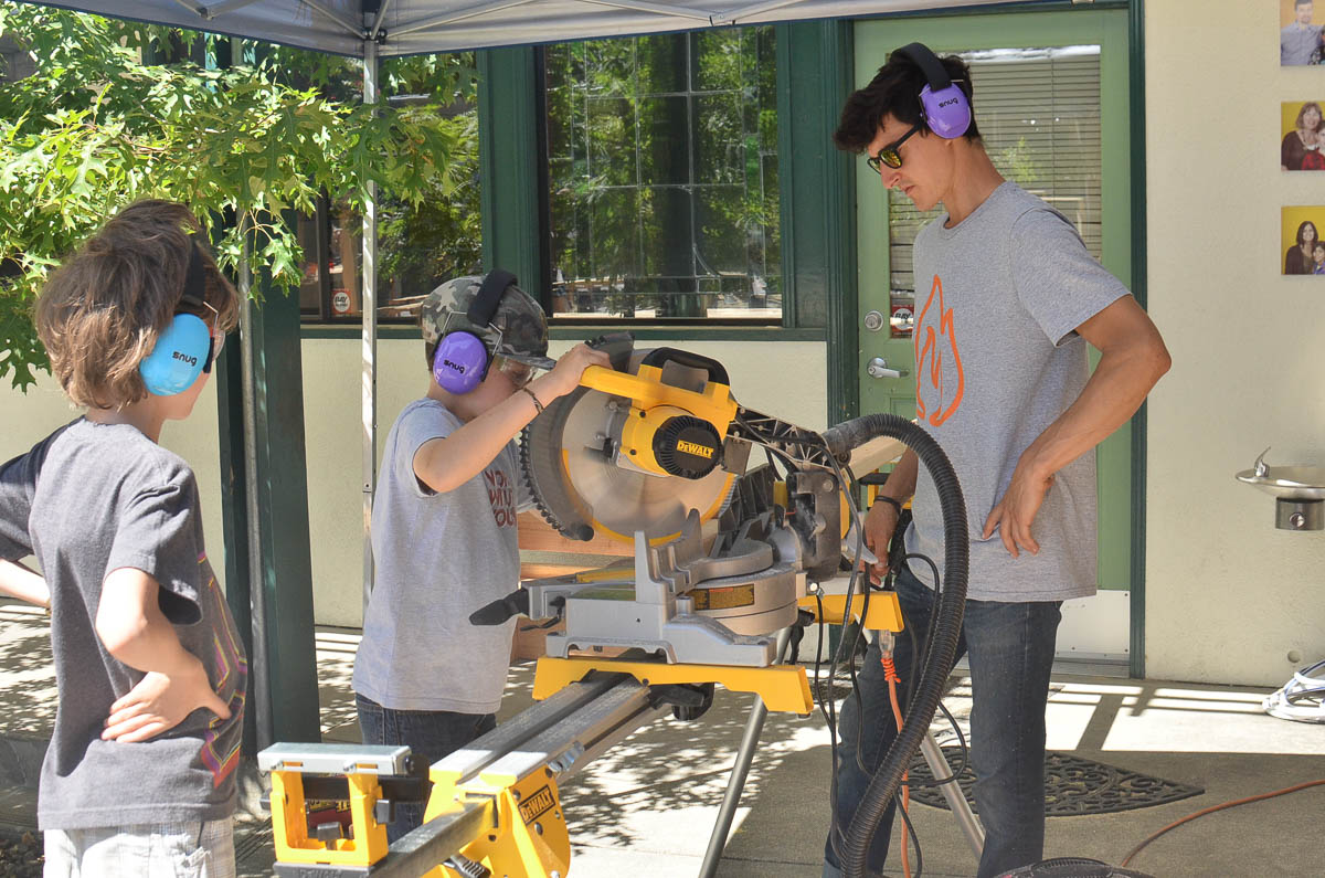  Cam and Rudy, our dynamic duo, on the miter saw (watched over by Ben). 
