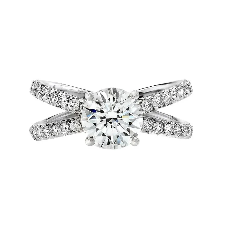 1.61 carat Round Brilliant Cut Diamond Twisted Shank Ring; 2.53 carat total weight. Set in platinum.