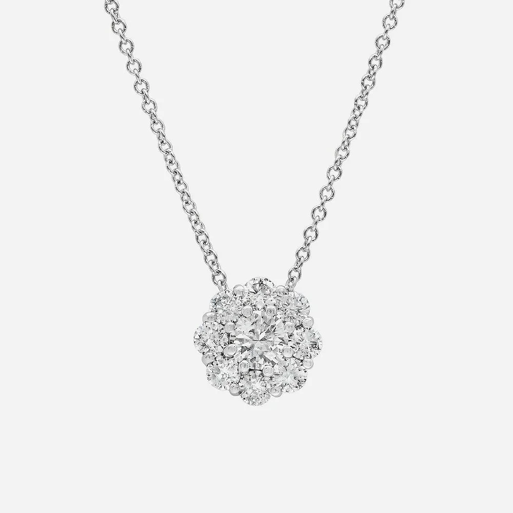 Cluster Diamond Pendant. 0.62 carats of Round Brilliant Cut Diamonds. Set in 18k white gold.