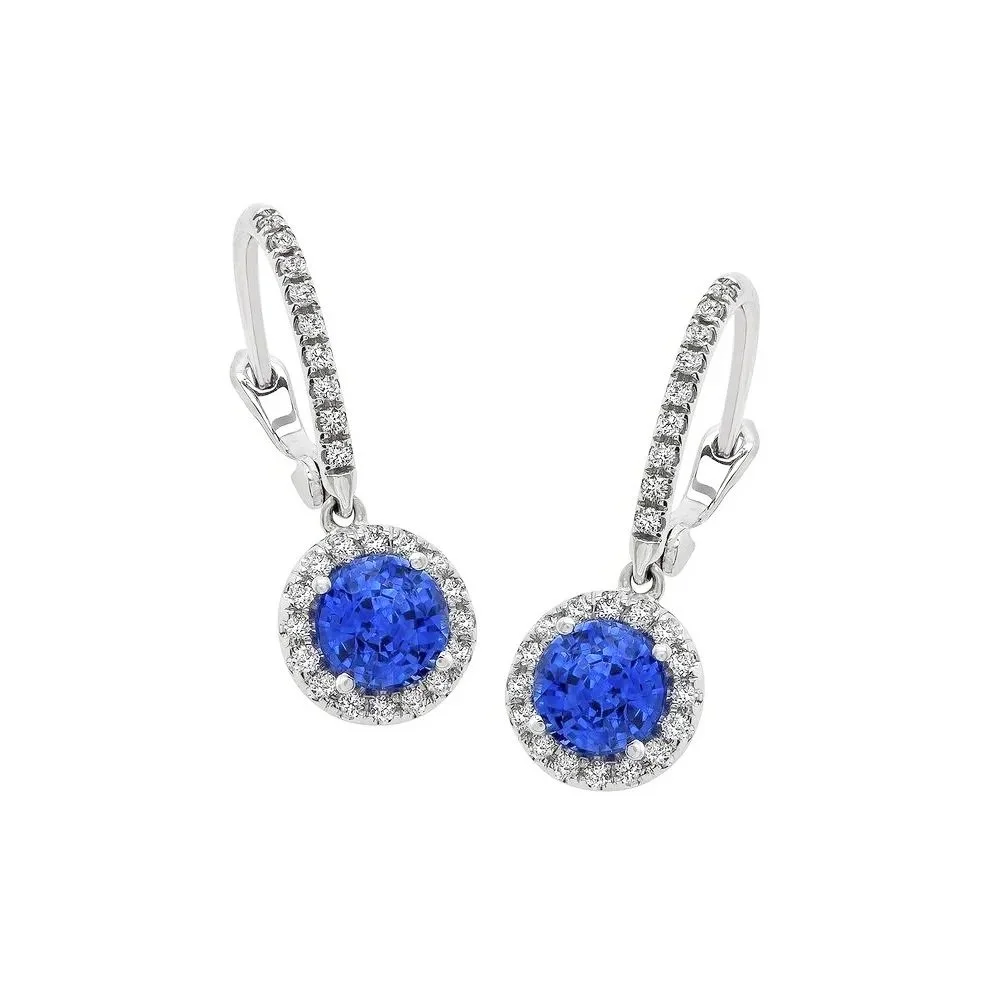 Drop Halo Earrings; 1.74 Round Cut Sapphire carat weight, surrounded by 0.31 carats of Round Brilliant Cut Diamonds. Set in 18k white gold. 