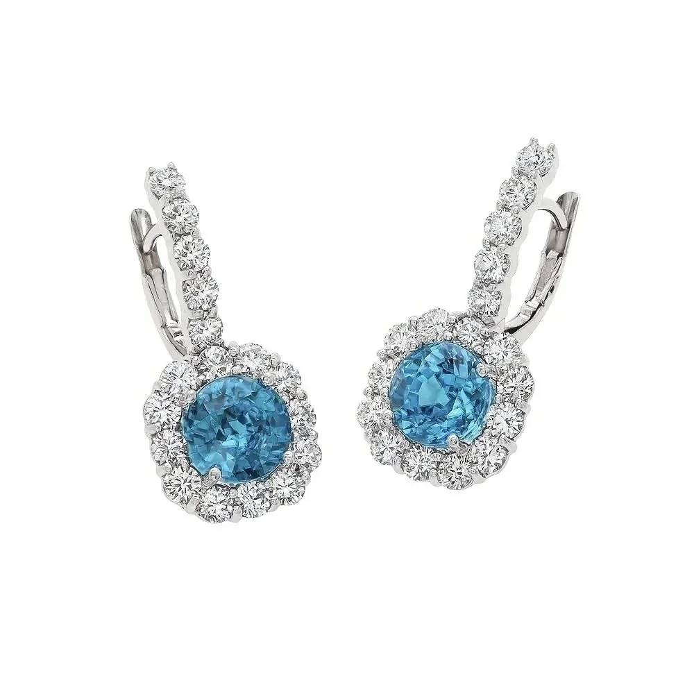 Blue Zircon Drop Cluster Earrings; 4.18 Blue Zircon carat weight, surrounded by 1.64 carats of Round Brilliant Cut Diamonds. Set in 18k white gold. 
