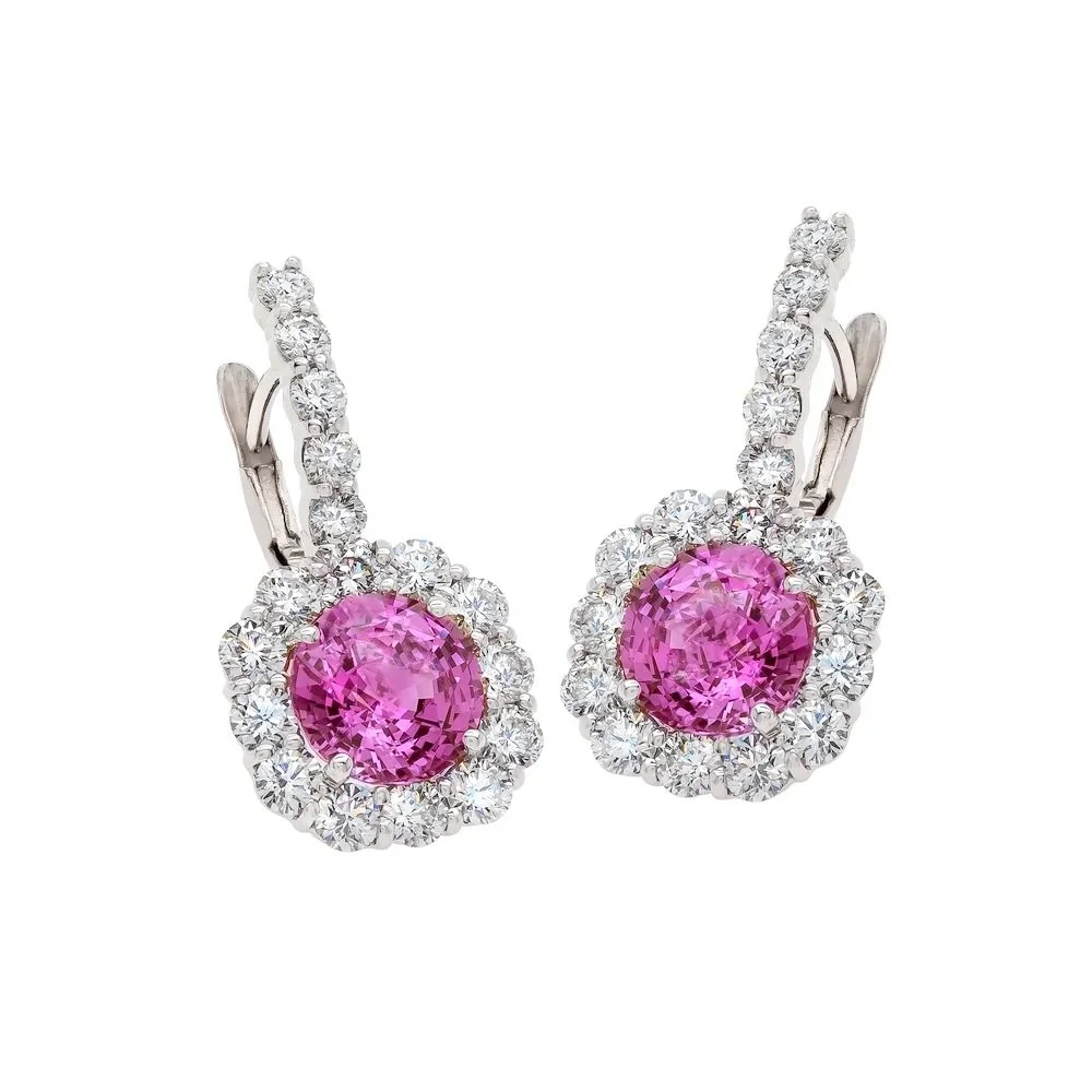 Pink Sapphire Drop Cluster Earrings; 3.81 carats of Pink Sapphires, surrounded by 1.96 carats of Round Brilliant Cut Diamonds. Set in 18k white gold.
