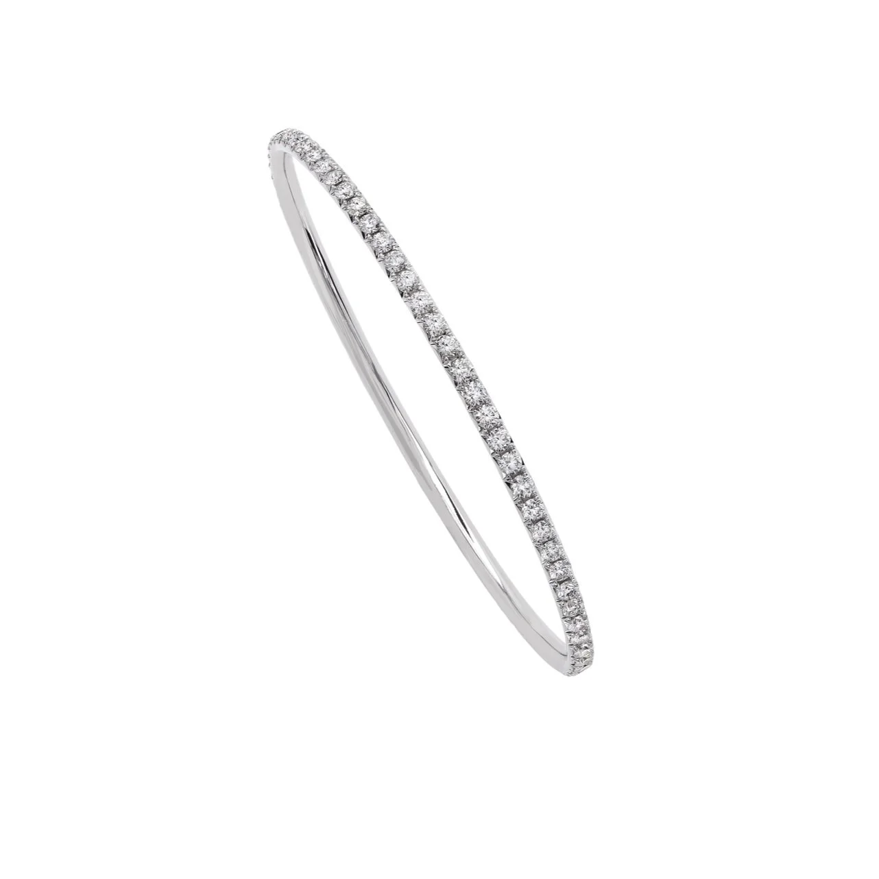 Signature Bangle Bracelet; 4.40 carats of Round Brilliant Cut Diamonds. Set in 18k white gold. 
