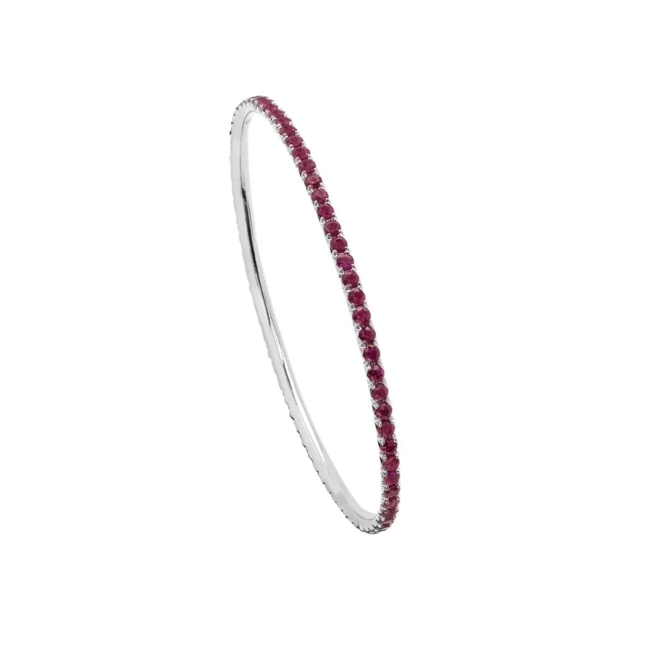 Signature Ruby Bangle Bracelet; 5.47 carat total weight. Set in 18k white gold. 