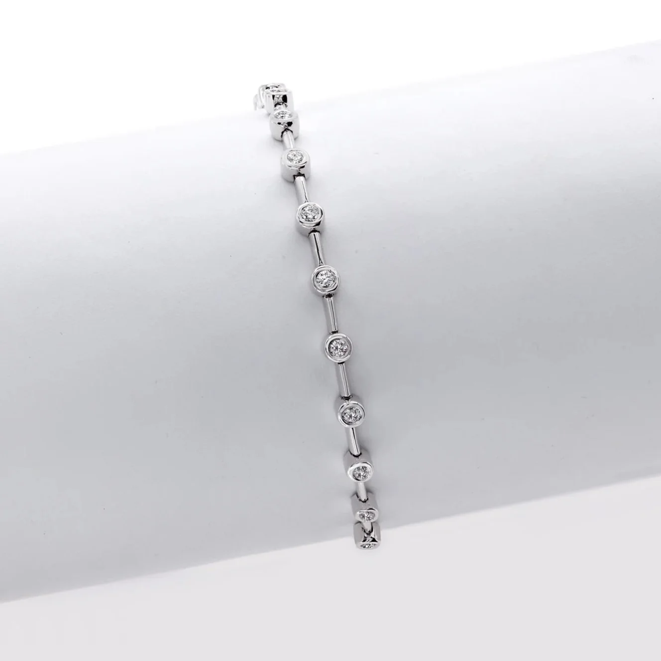 Stackable Bezel Bracelet; 1.07 carat total weight in Round Brilliant Cut Diamonds. Set in 18k white gold. 