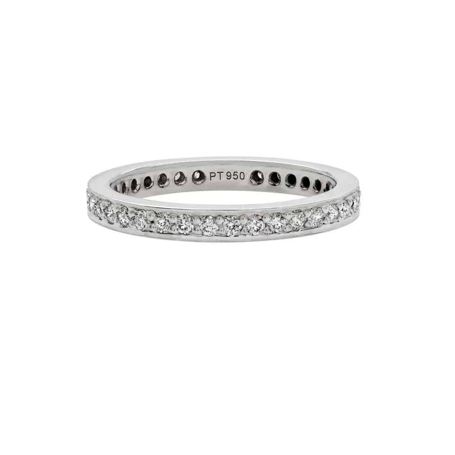 Channel-Inspired Bead-set Eternity Wedding Band; 0.54 carat total weight in Round Brilliant Cut Diamonds. Set in platinum. 