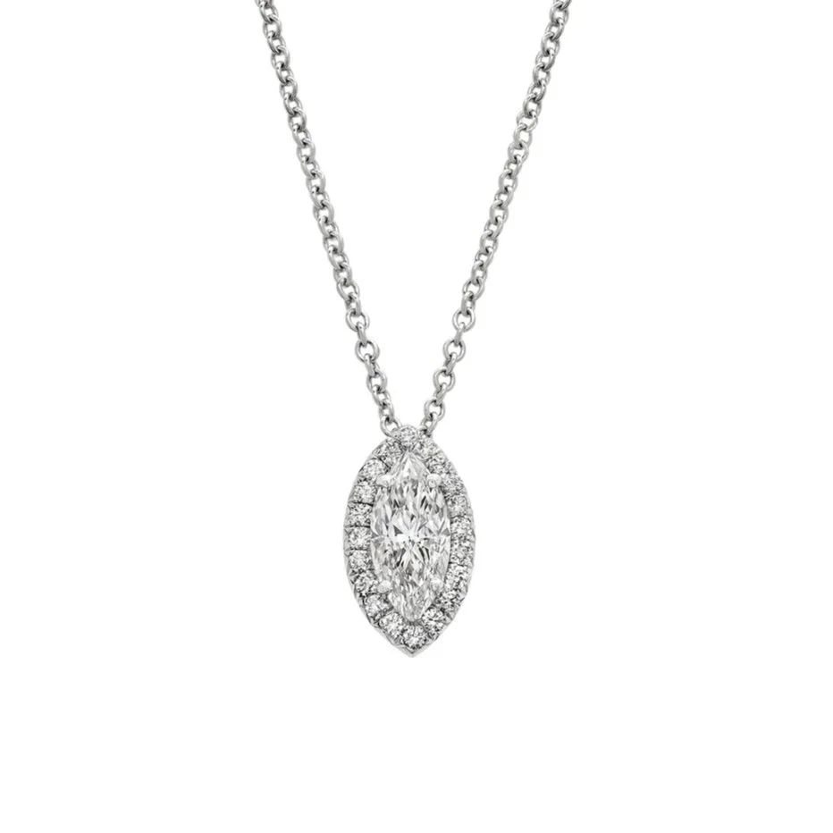 1.24 carat Marquise Cut Diamond Halo Pendant. 0.27 carats of Round Brilliant Cut Diamonds surround the center stone. Set in 18k white gold. 