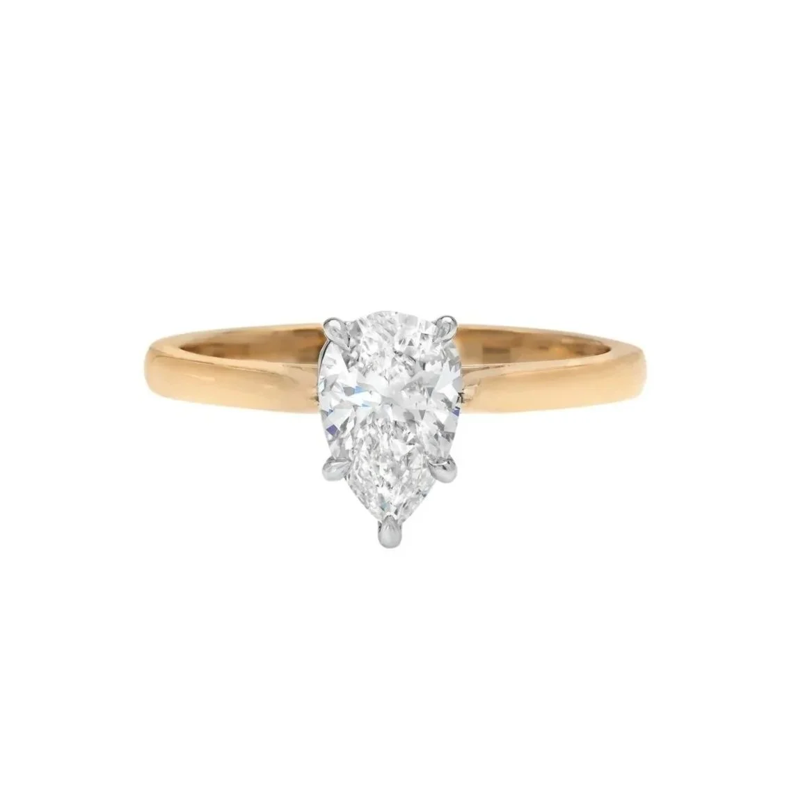0.89 carat Pear Cut Diamond Ring. Set in 18k yellow gold and platinum.&nbsp;