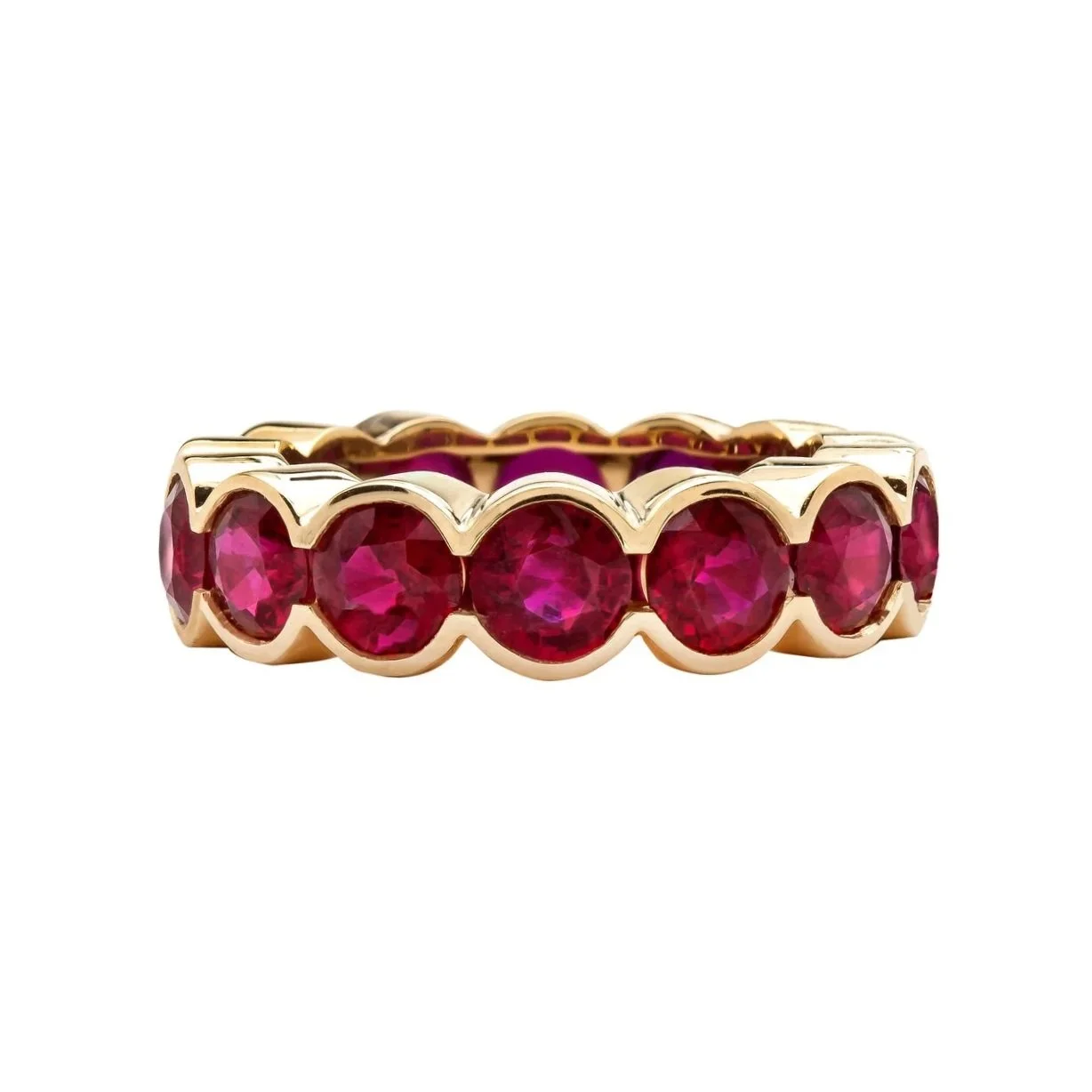 6.30 carat Round&nbsp;Ruby Half-Bezel Eternity Ring. Set in 18k yellow gold.&nbsp;