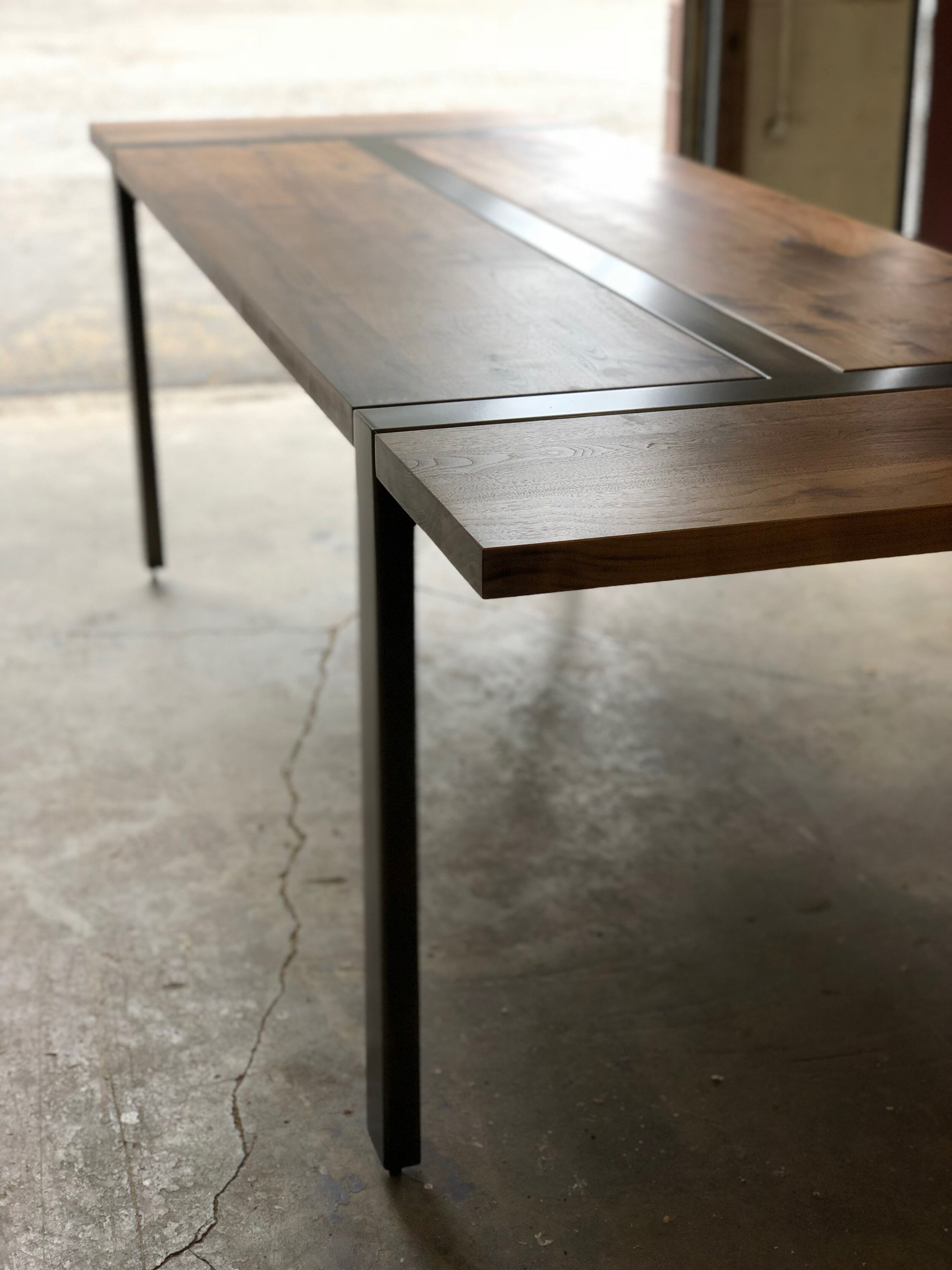 custom expandable walnut dining table