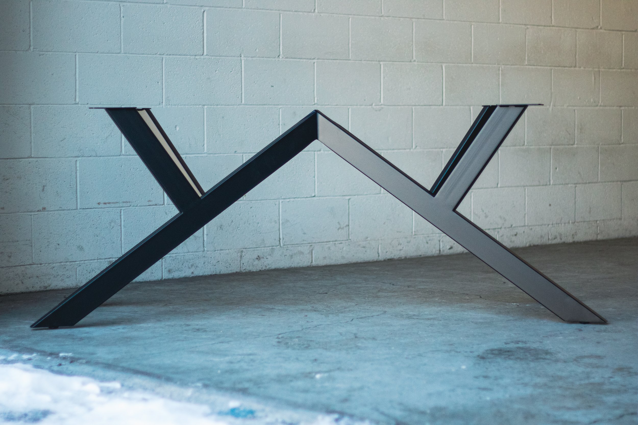 custom metal pedestal table base