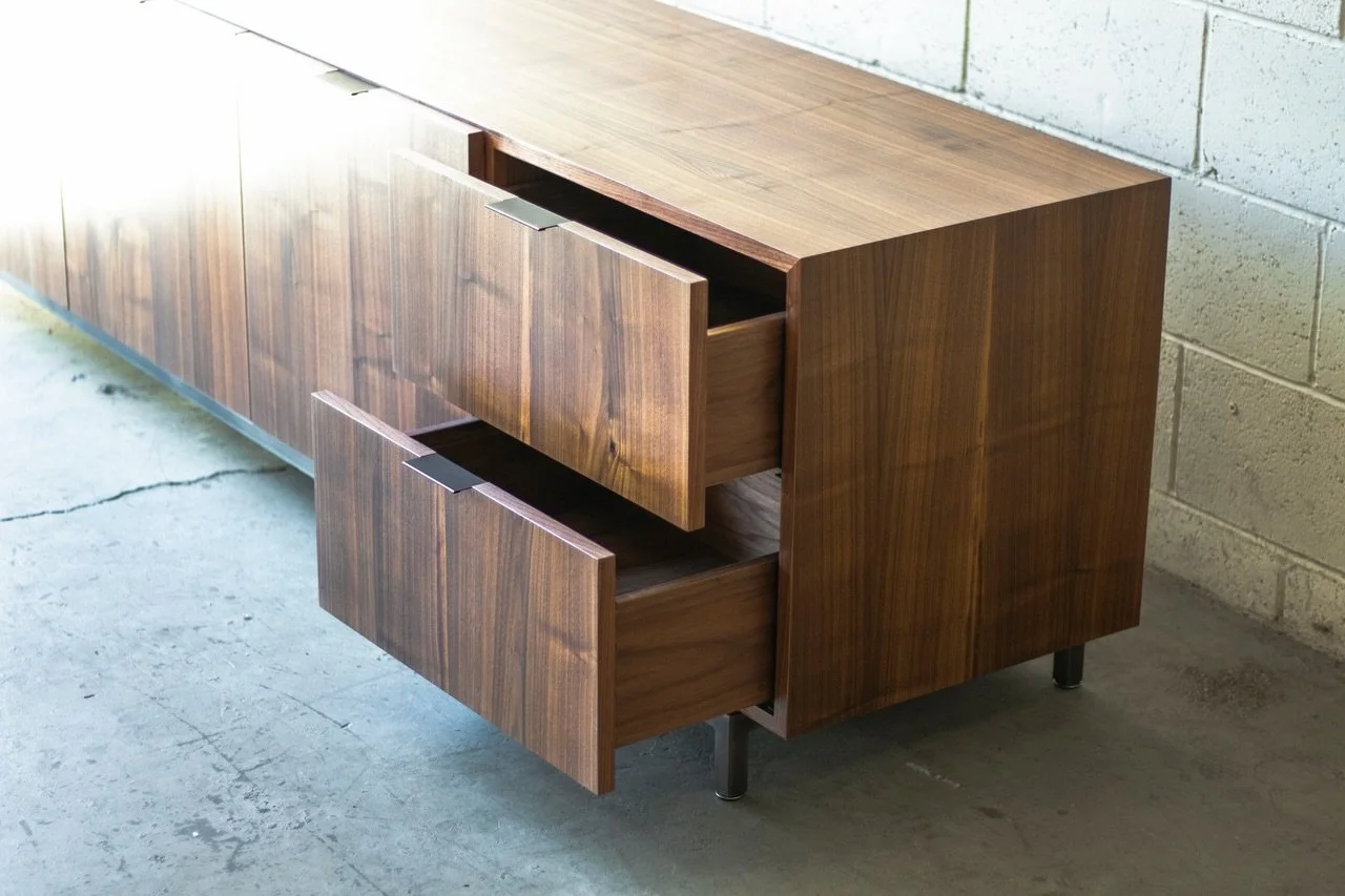 It&rsquo;s inevitable that wood moves, and we can do whatever we want to contain it, but wood&rsquo;s gonna creep. Trying to minimize that movement here while still letting the material speak clearly.

The cabinet and doors were faced with shopsawn v