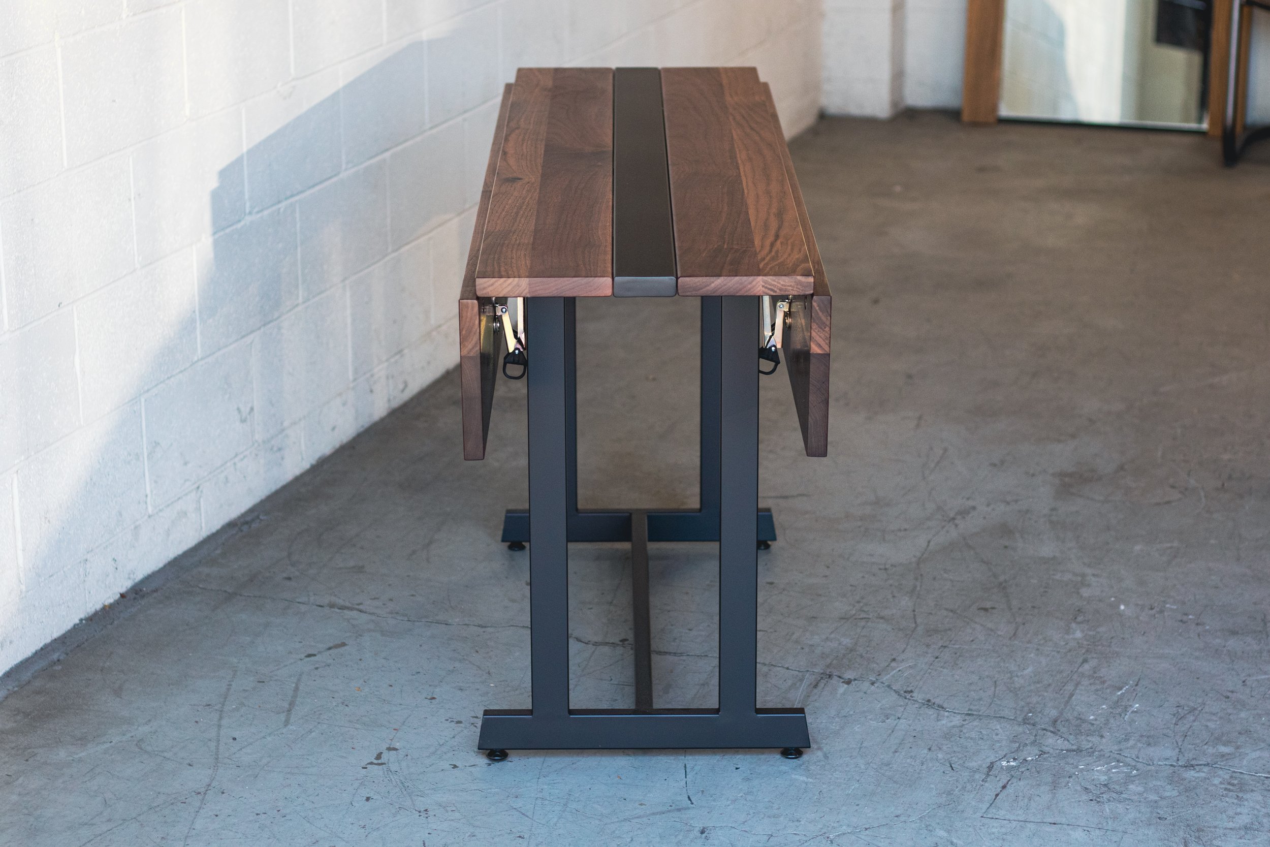 10.17.22_Insignia_Table_Walnut_Showroom_03.jpg