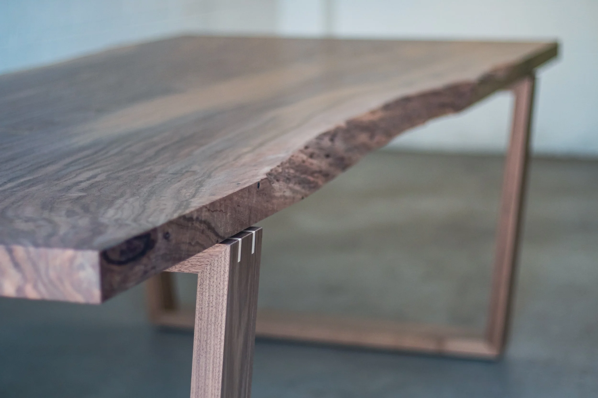 SUMMER SOLSTICE  |  Live Edge Walnut Slab Dining Table  |  Wide-Set Reverse Trapezoid Wood Legs w/ "Floating" Tabletop