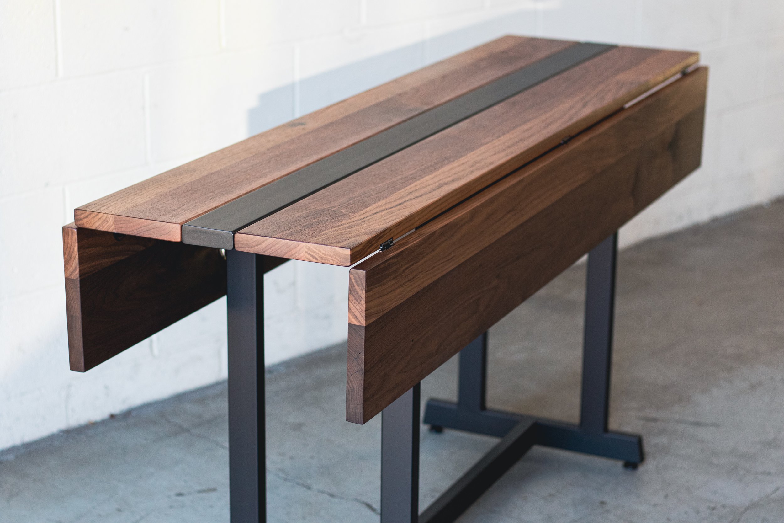 10.17.22_Insignia_Table_Walnut_Showroom_02.jpg