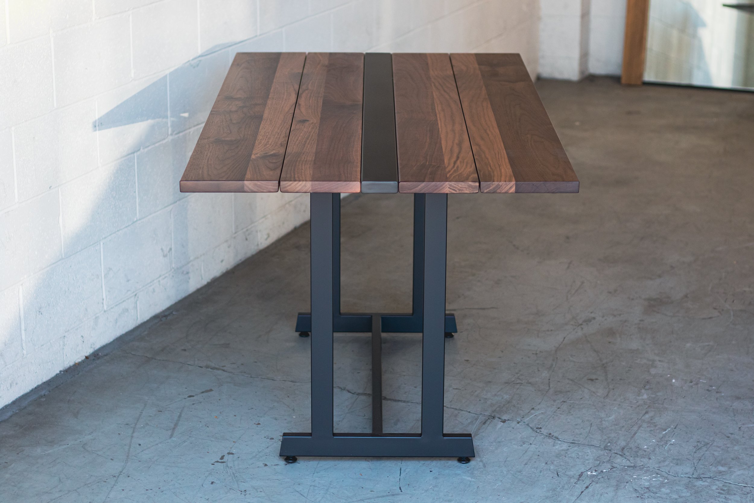 10.17.22_Insignia_Table_Walnut_Showroom_04.jpg
