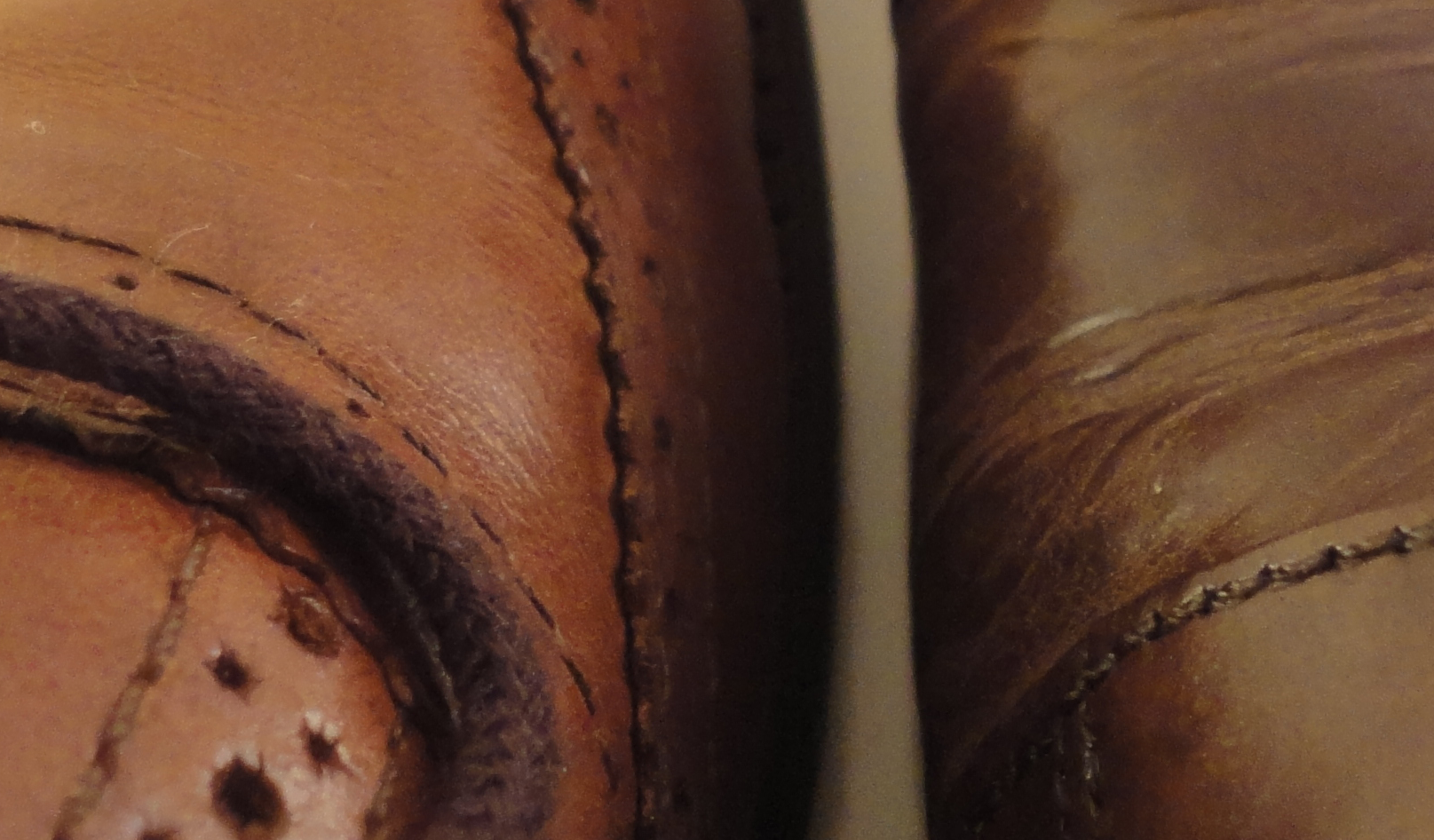 Full grain (left) VS Corrected grain (Right). Full grain leather typically have gentle creases while corrected grain cracks (see example below) 