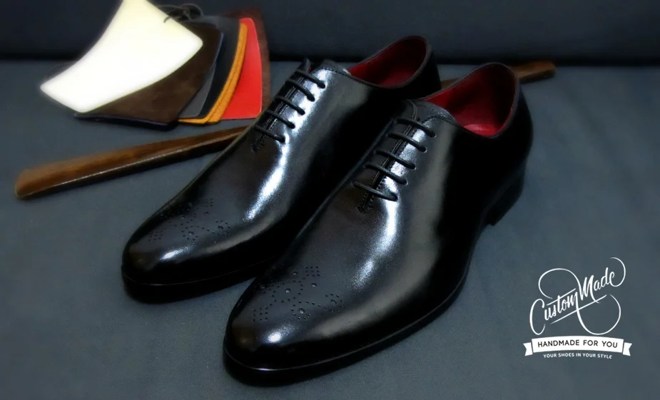 Black Wholecut with Medallion Toe. Characterize by its simplicity and elegance(very formal - meant for black tie events) 