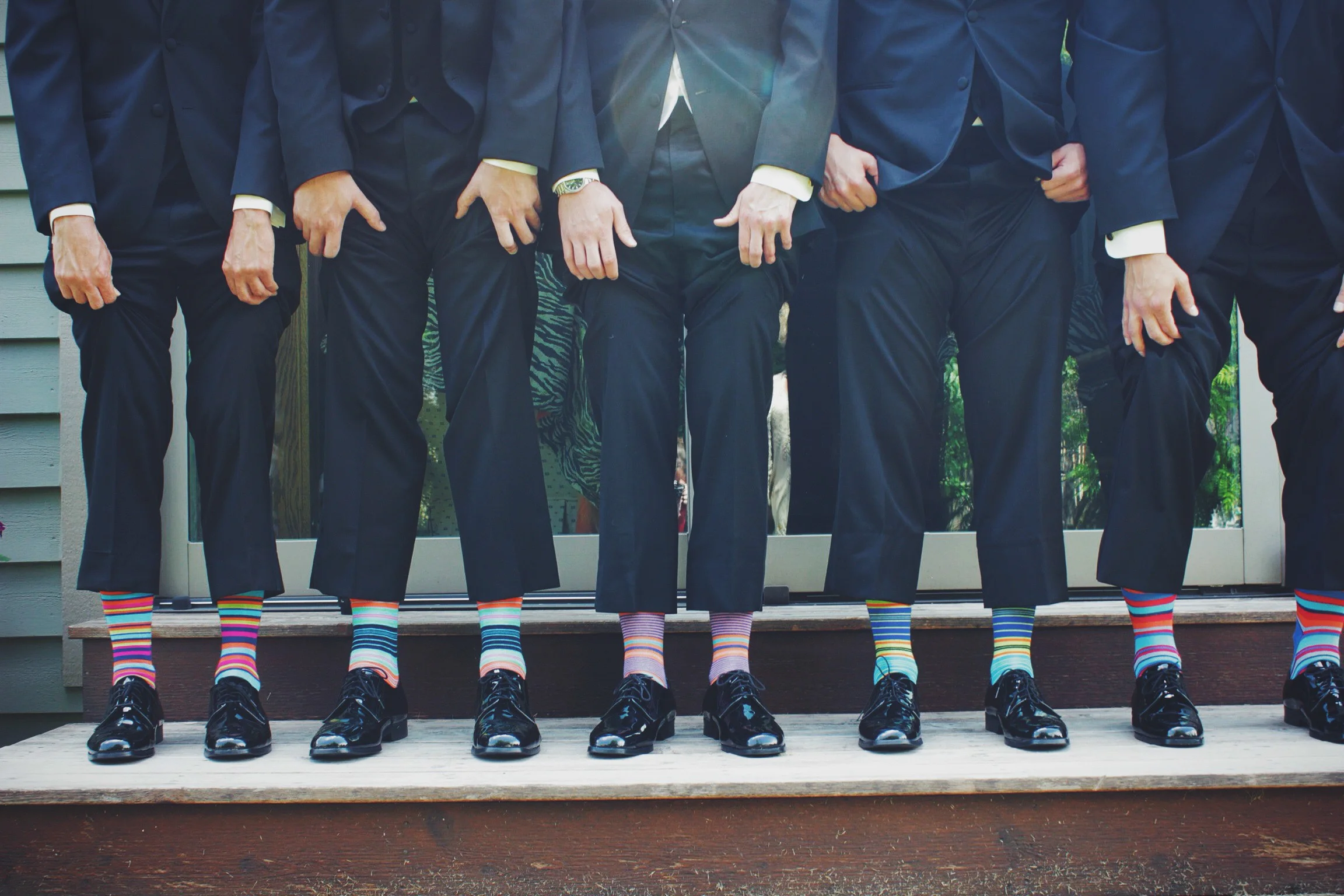 Matching shoes and suit but a touch of flair on the socks. 
