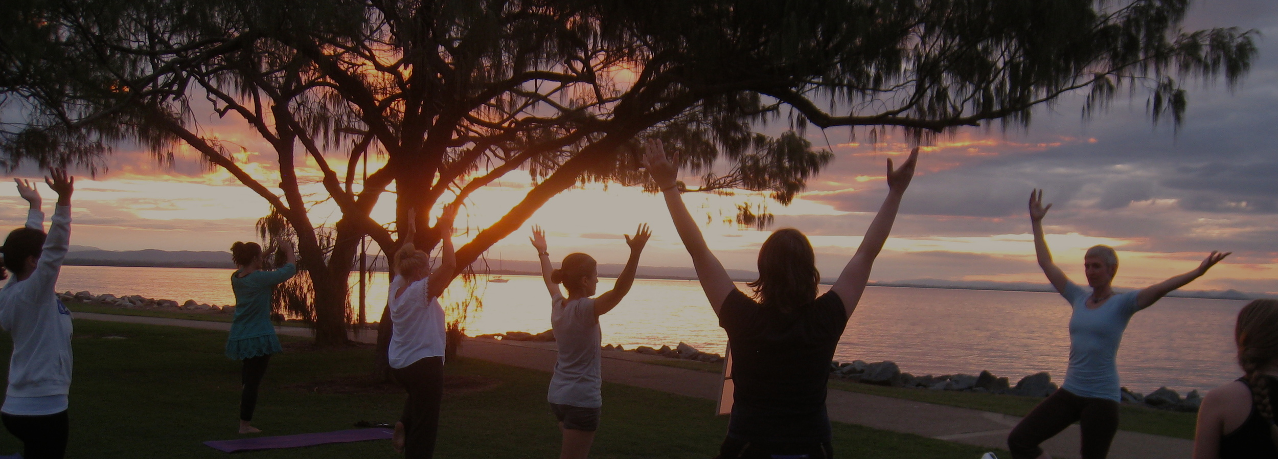 Supporting ourselves and each other in tree pose.