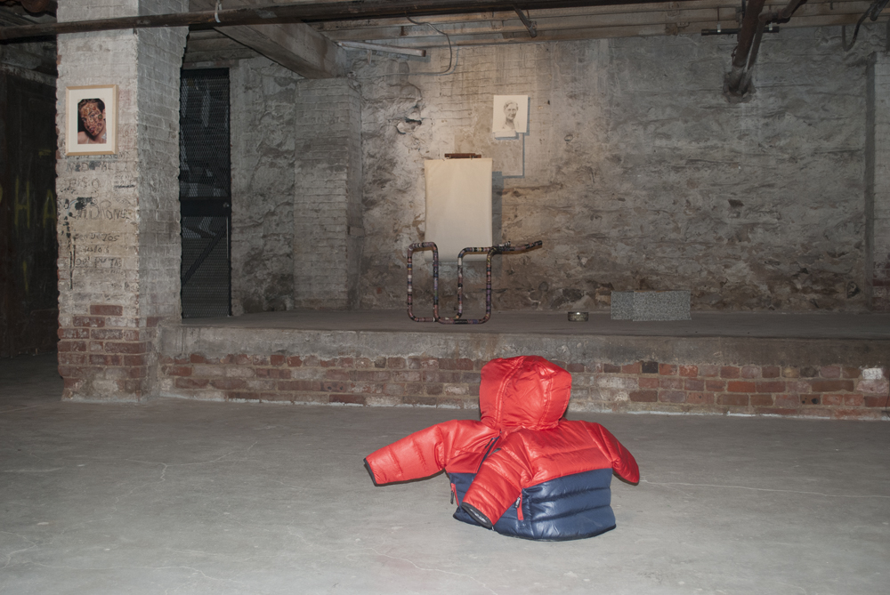 William McMillin "Double Jackets", 2003, two identical children's nylon parkas, dimensions variable Natalie Labriola "Untitled" Temporary tattoos on magazine advertisement, 8 x 10 PW3 "Cobra Gimp", 2011, metal, string, and "Museum piece with fountai