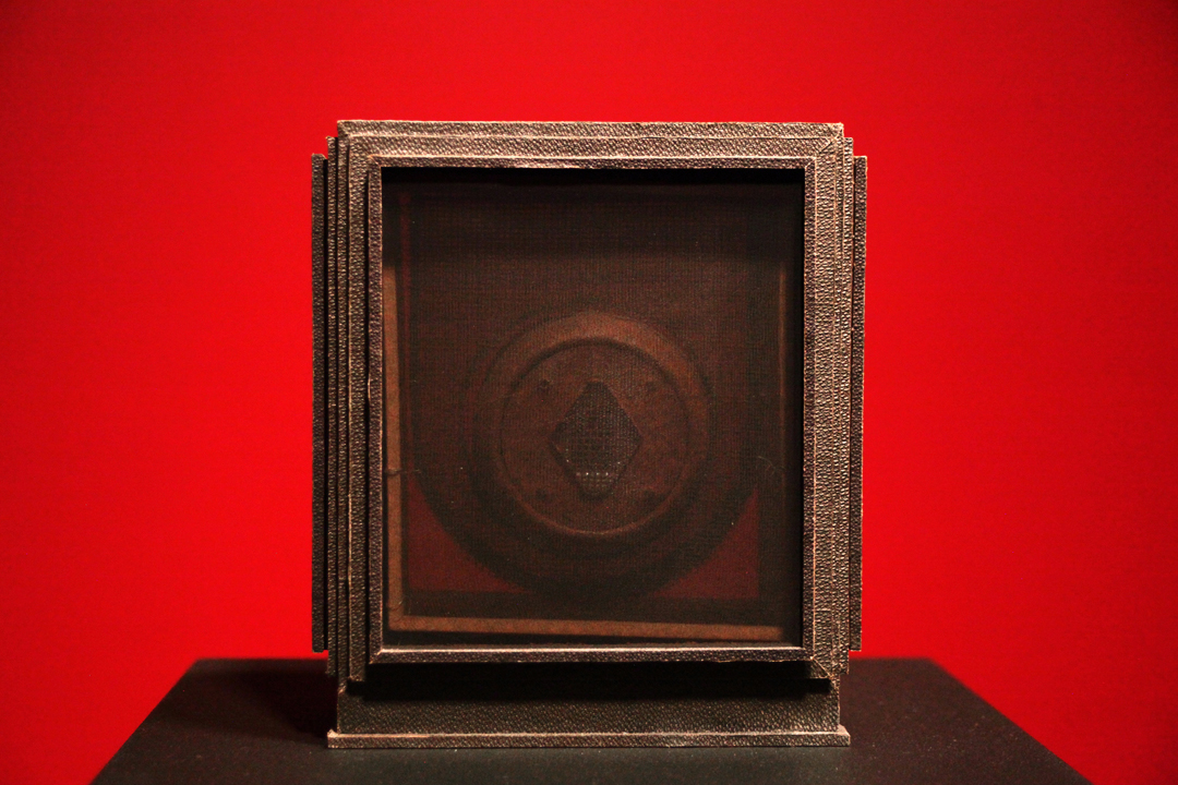 dan Waller shame three 1996 wood, coated cloth, leather, pearls, metal, metal screen, nylon stocking 4" x 6" x 6 3/4"