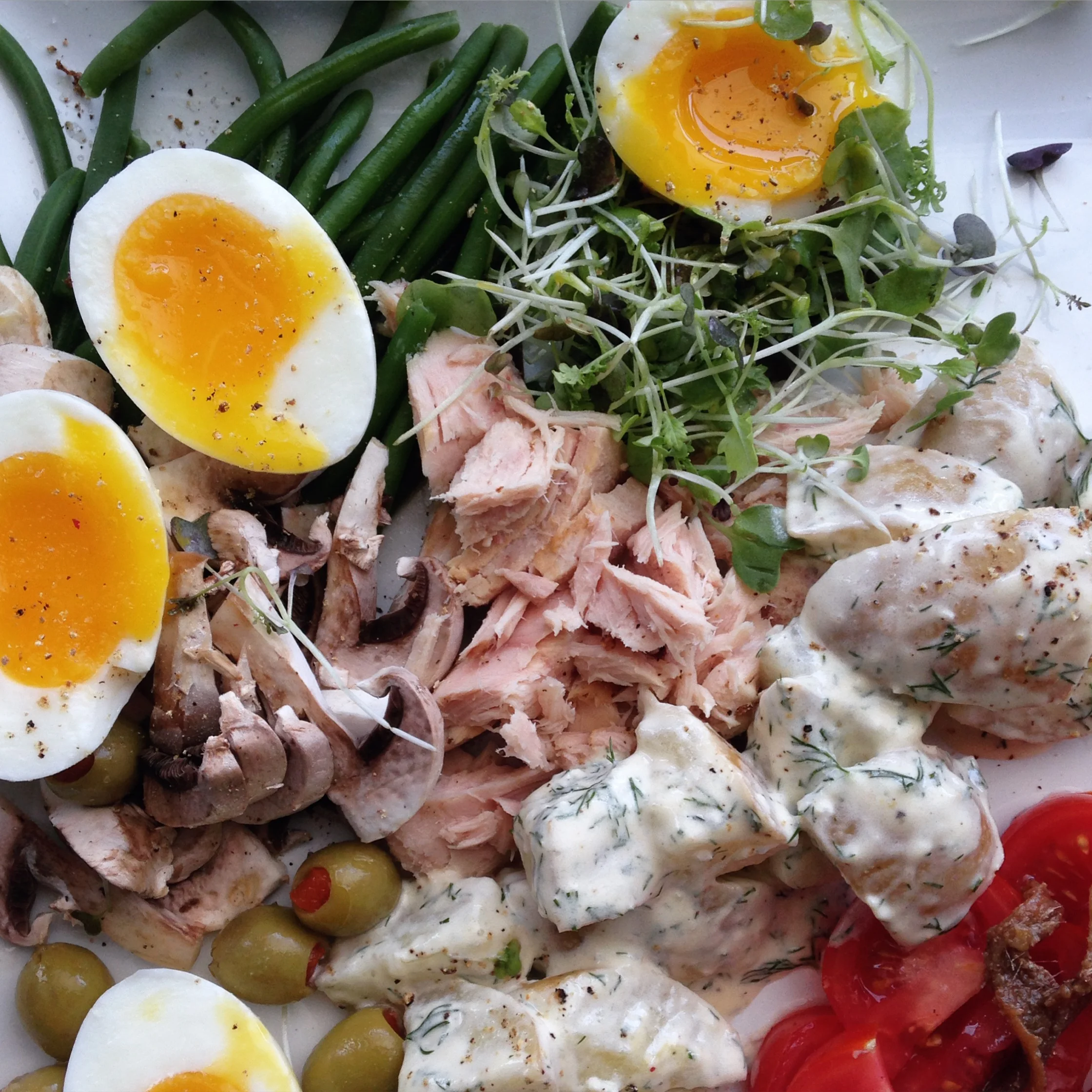  Nicoise-y salad. Soft boiled eggs, tuna, mushrooms, olives, tomatoes, anchovies, micro-greens, potato salad with dill vinaigrette. First time I've actually been thrilled to make &amp; eat a salad.&nbsp; 