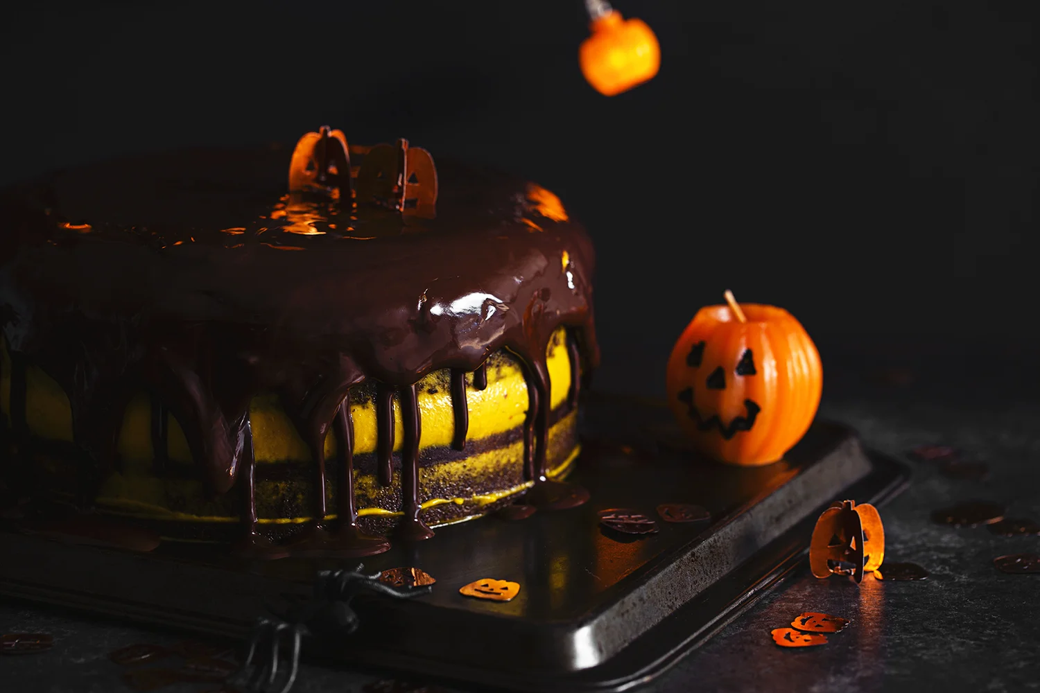 Vegan Halloween Recipe: deliciously fluffy and moist Chocolate &amp; Pumpkin Cake, frosted with an Orange Cashew “Buttercream”.