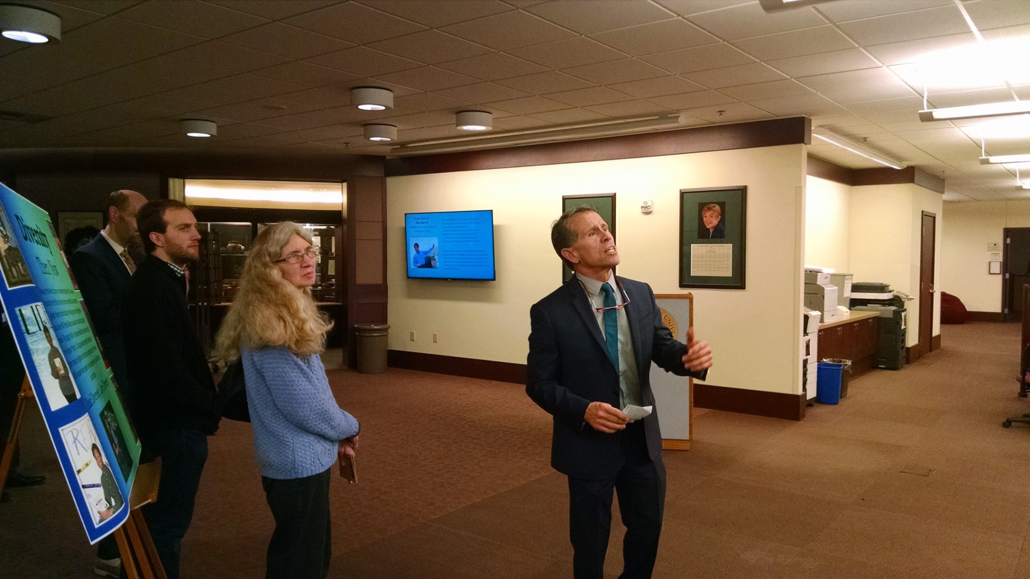 Mayor Tari Renner eyes the exhibit.