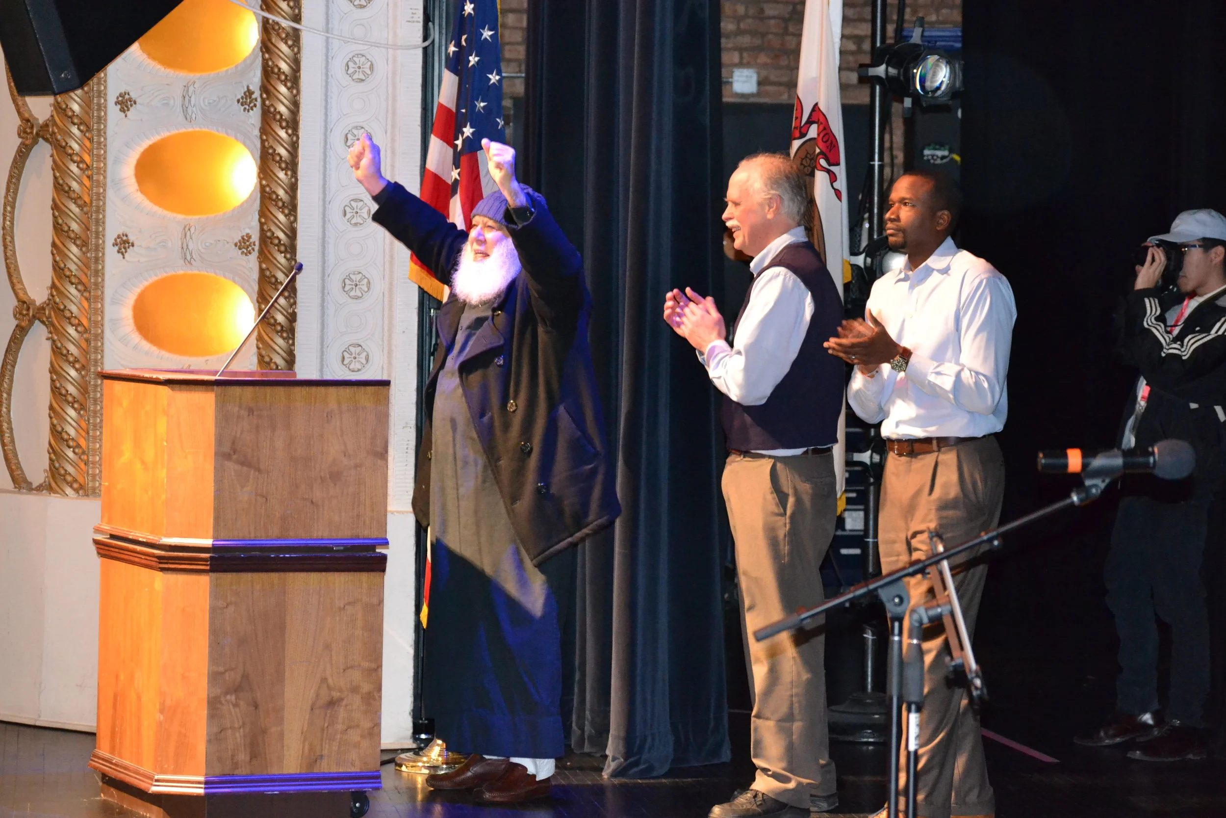 Bloomington's Imam Abu-Emad Al-Talla, with NIOTBN's Mike Matejka and Dontae Latson.