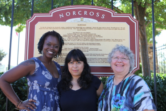 From left to right partners of Norcross Community Market: Sagrdina Jalal, Executive Director of Georgia Farmers Market Association; Karla Blaginin, Primary Analyst, Dichos de la Casa; Connie Weathers, Founder and Chair of Sustainable Norcross