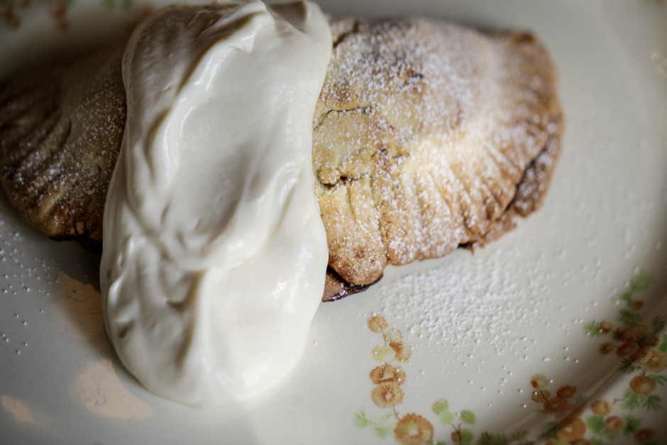 Riesling Raisin And Apple Hand Pies With Brown Sugar-Sour Cream Sauce. 