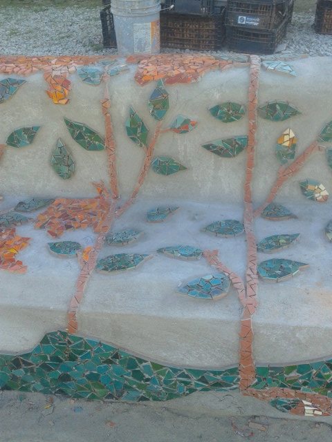 los sauces 4 walls park space trash sustainable contruction bench tree.jpg