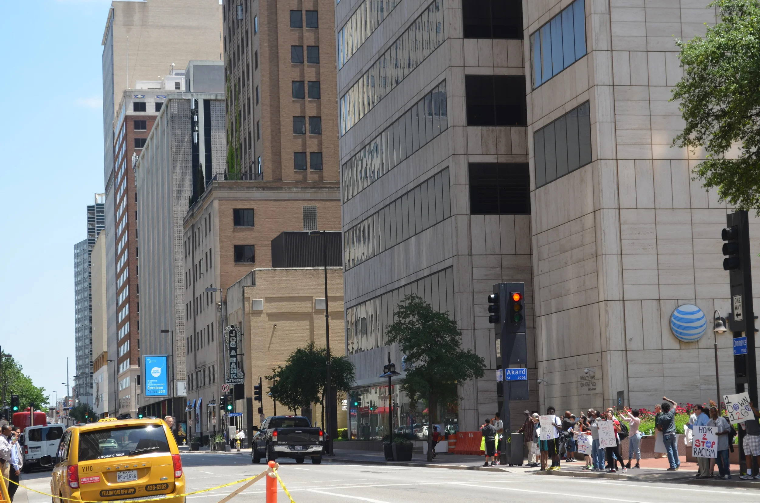 The height and air-conditioning of my lodging prevented me from experiencing the street level drama as I did last year. The plaza across the street at the foot of the bulky Whitacre Tower , AT&T world HQ, offered some satisfying ruckus however. Apparently an executive at AT&T used his work phone for racist commentary. He was rebuked daily and vociferously. I gather he has since been fired. 