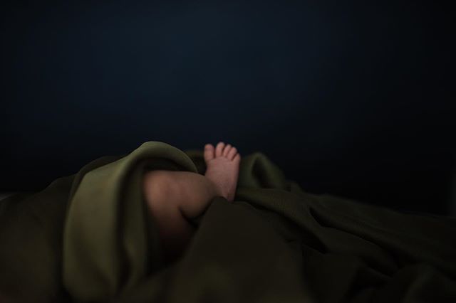 Tiny blurry baby toes