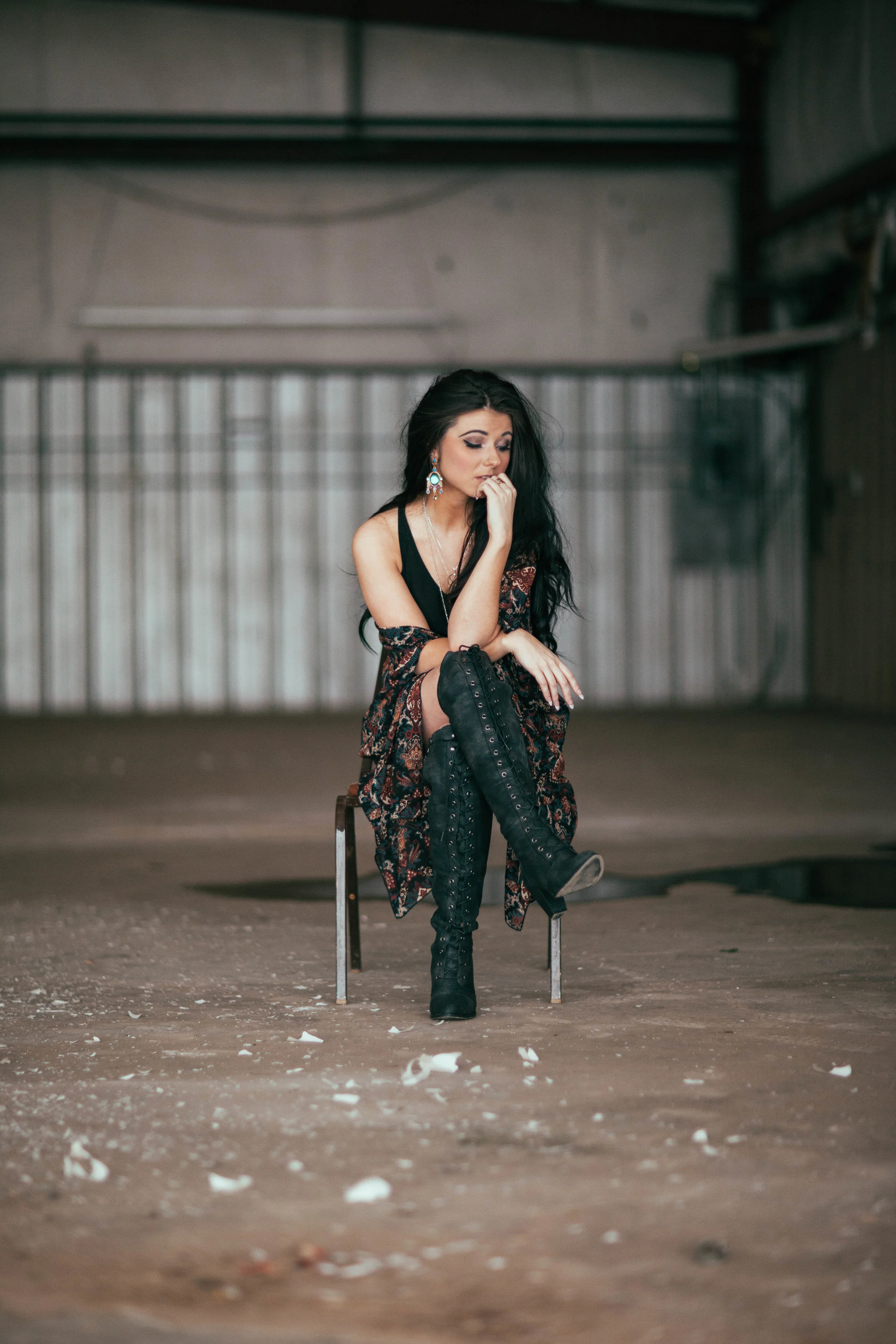 Hannah inside the abandoned airplane hangar.