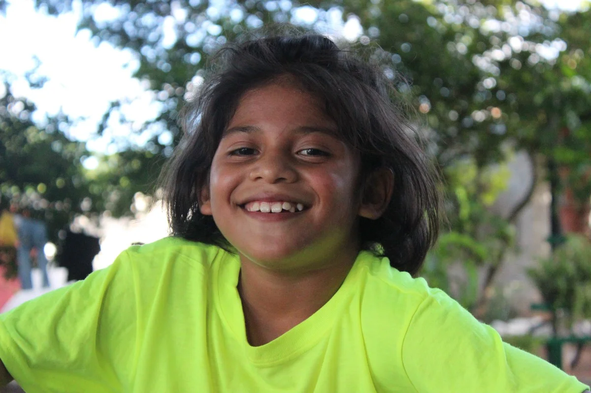 Karen flaunting her new haircut which helps to hide the wounds still visible on her head (photo by Mallory Lehenbauer).