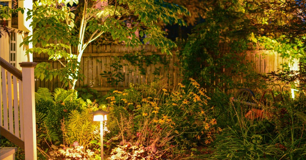Low voltage path lighting and garden lighting installation in a Syracuse backyard