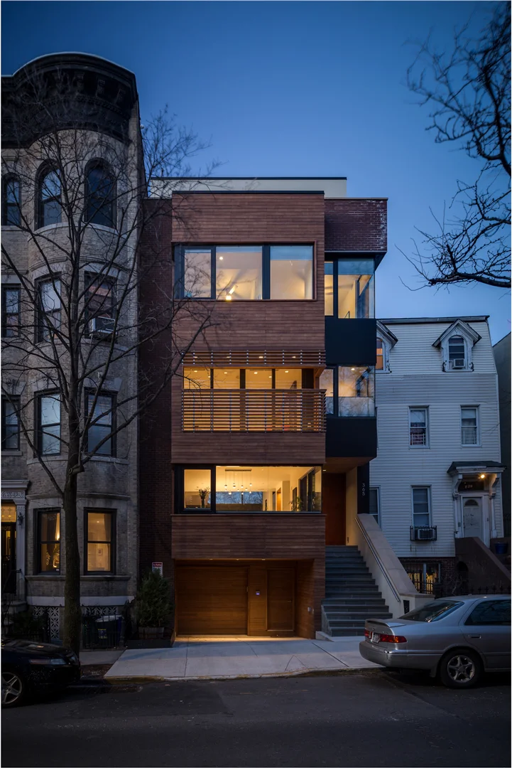 Here is the base image (with no additional lights added). This was taken several minutes after sunset to capture a balance of the darker blue sky and the warm inviting interior. But the warm tones of the cedar are lost and blend in with the brick material a little too much for my liking.