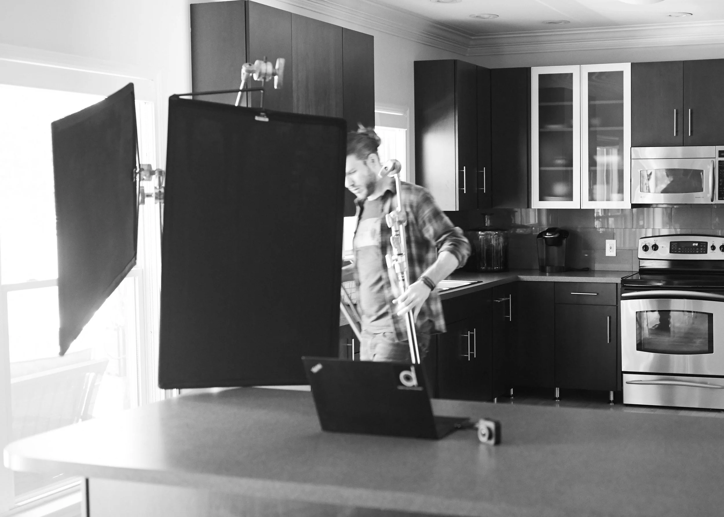 Chad doing double duty as my First assistant and Digital tech for a shoot with Cobra Electronics.